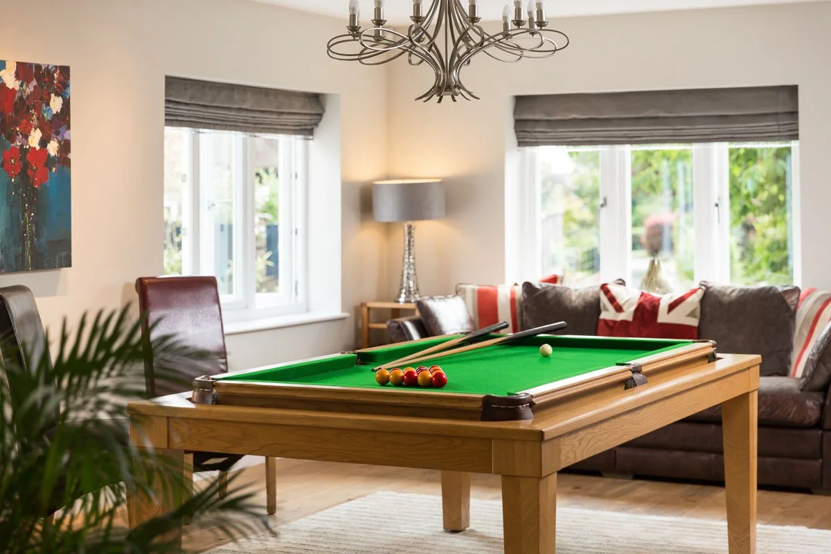detail shot of games room with pool table and cost sofa 