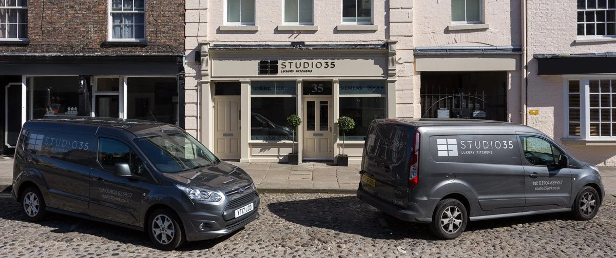 front shot including shop vans of studio 35