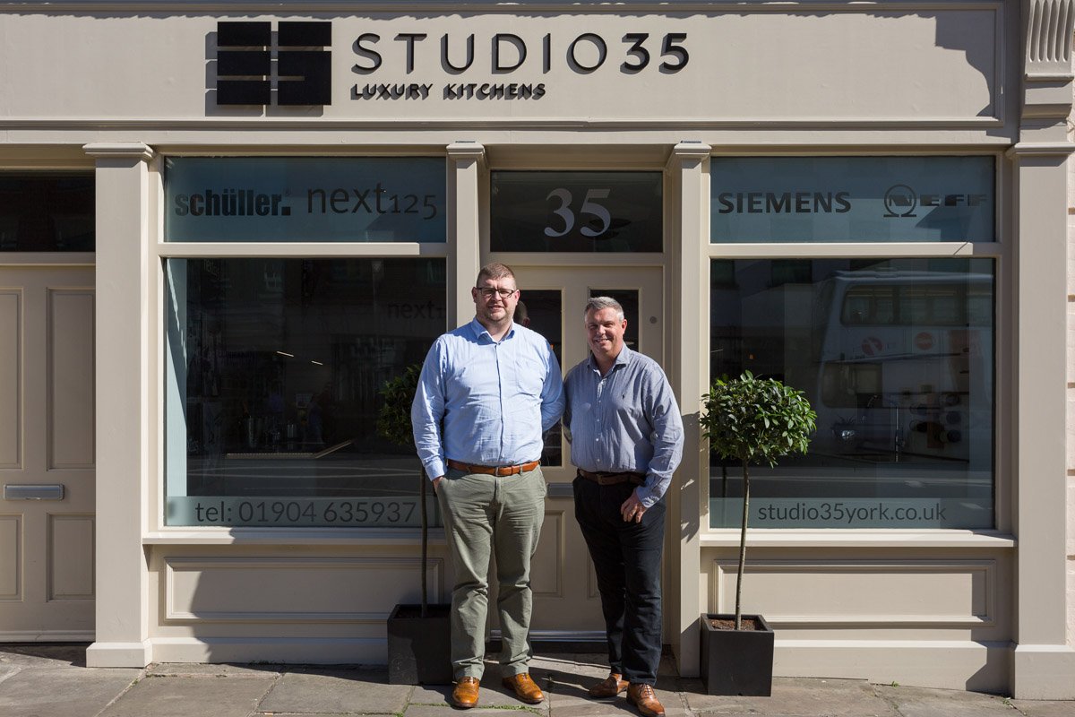 front shot including the owners of kitchen designers studio 35