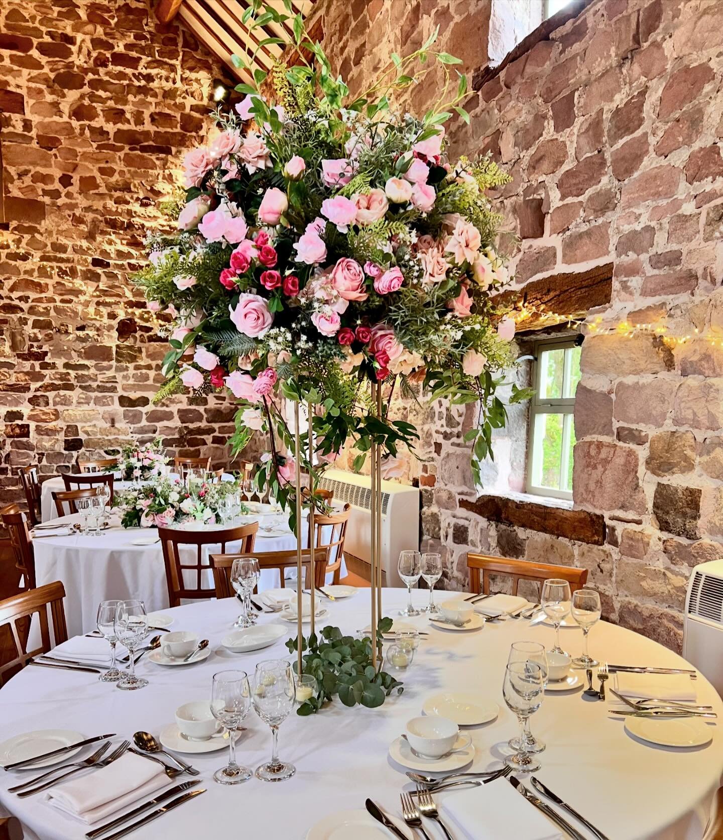 Pink. Our pink tall floral centrepieces looked amazing yesterday in the beautiful rustic barn setting at @theashesbarns. We have a full range of matching tall and low centrepiece options. 
#vintagevenuedressing, #theashesbarns, #theashesbarnswedding,