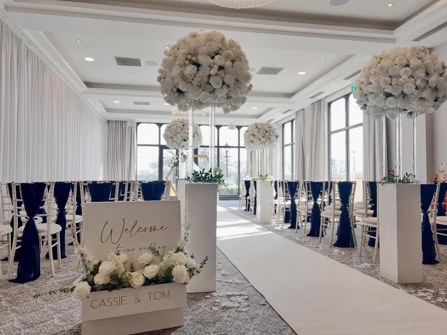Cassie &amp; Tom.
What a beautiful wedding at @rookeryhallhotelspa on Saturday. The room looked so pretty with big bold white florals to line the aisle and navy chiffon drapes on the chairs. The Spring sunshine warmed the air and the room was full of