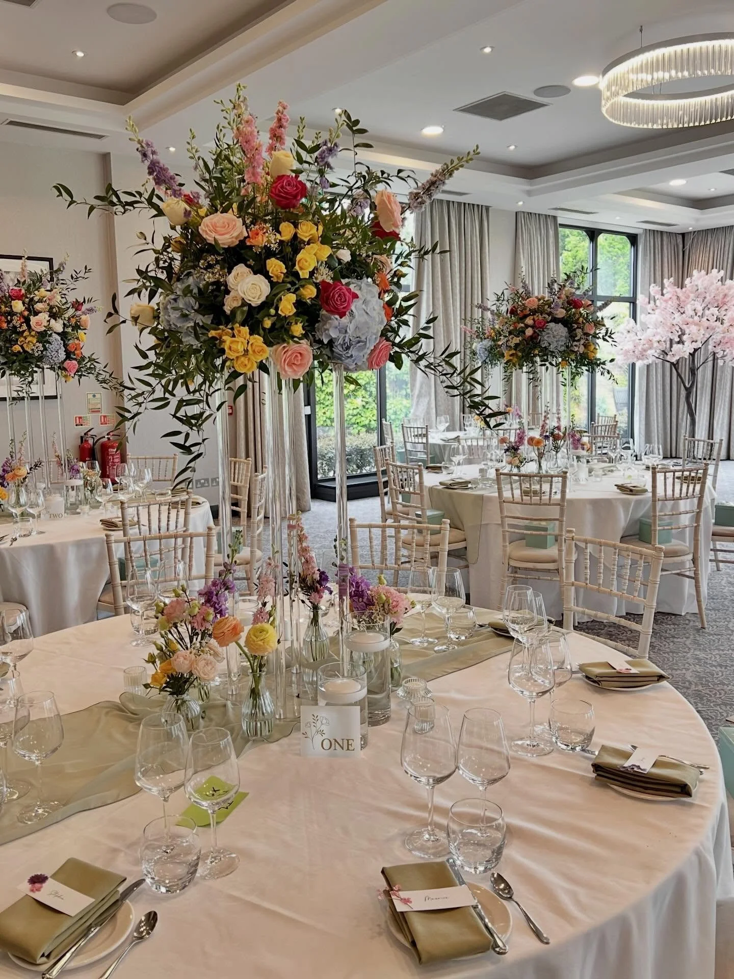 Bex &amp; Chris.
A room full of bright flowers was the brief for this wonderful joint celebration of a 50th birthday and 25th wedding anniversary.
80 guests for a 5 course tasting menu, a live band and a DJ. They certainly know how to throw a party!
