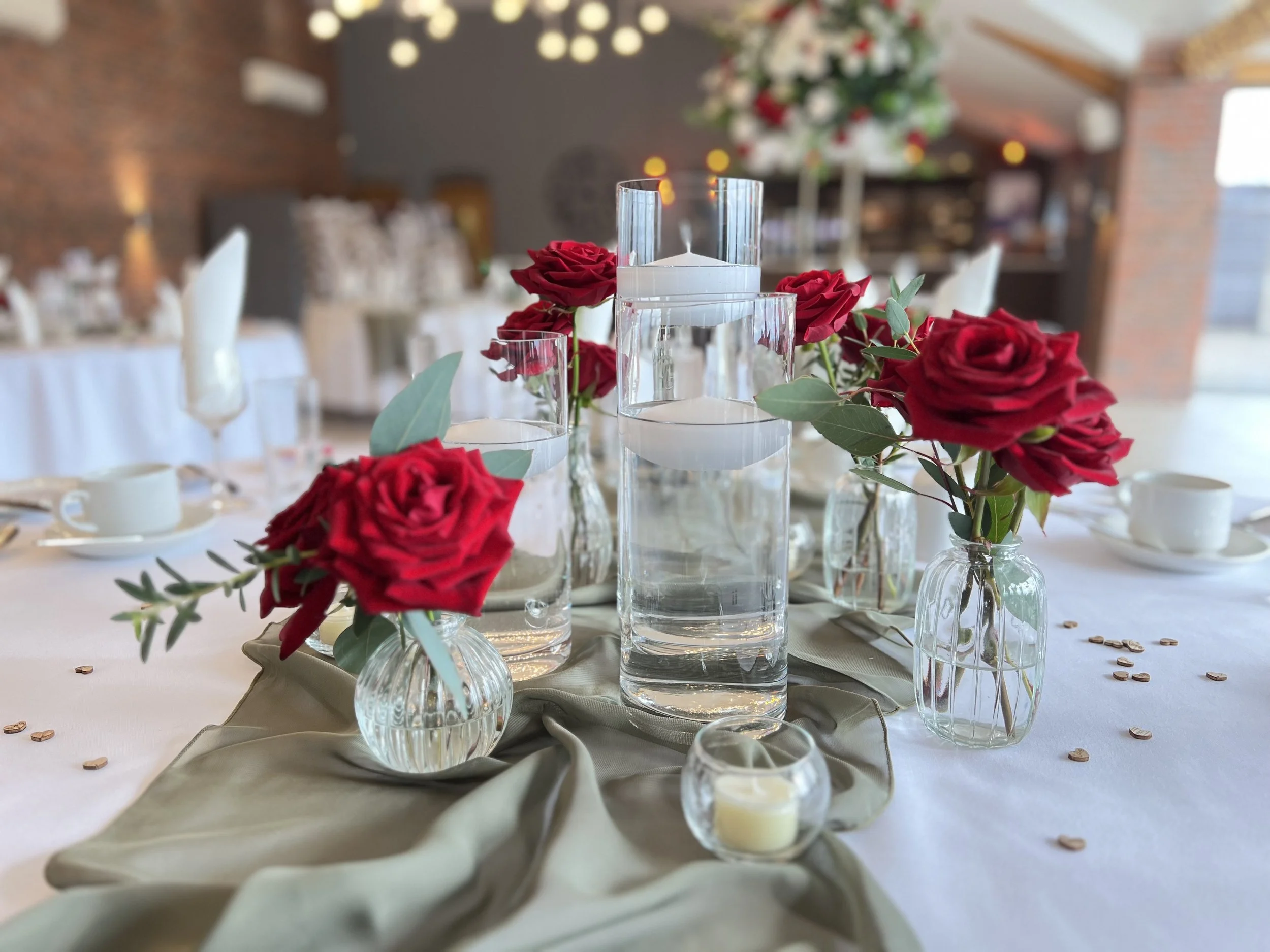 cylinder vase with bud vase with red roses.jpeg