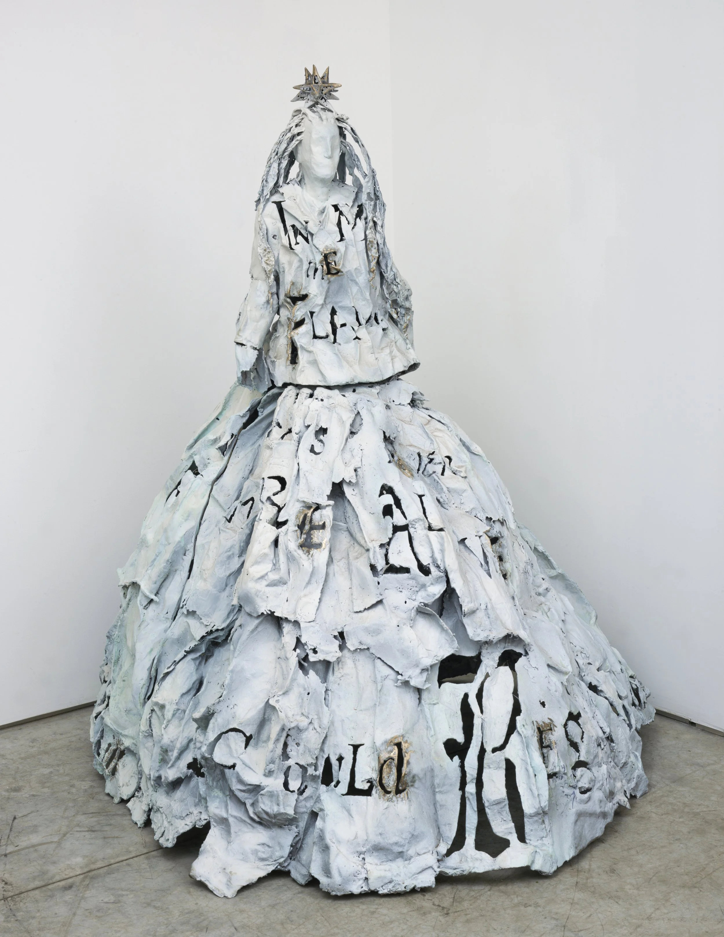 LESLEY DILL: WOMAN IN DRESS WITH STAR ("IN MEE THE FLAME WAS NEVER MORE ALIVE - - - I COULD BEGINNE AGAIN"- JOHN DONNE), 2011, bronze with light blue/white patina, 52 x 52 x 61 in. 132.1 x 132.1 x 154.9 cm.