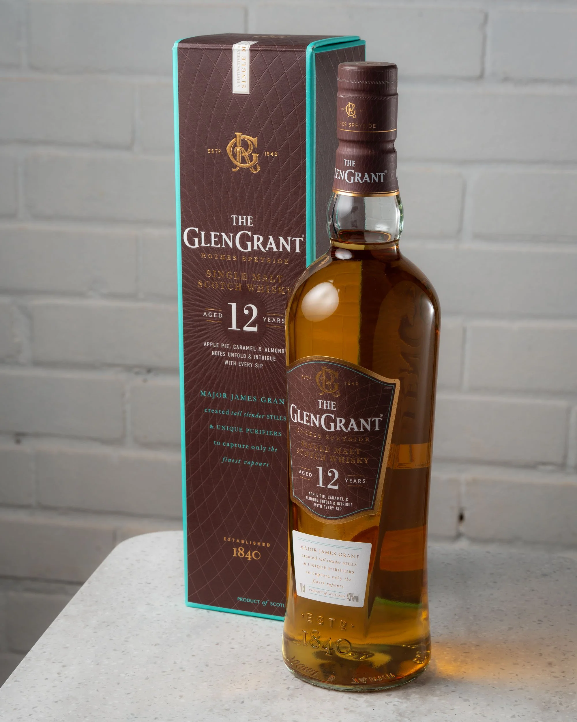 A bottle of Glen Grant 12 next to it's box