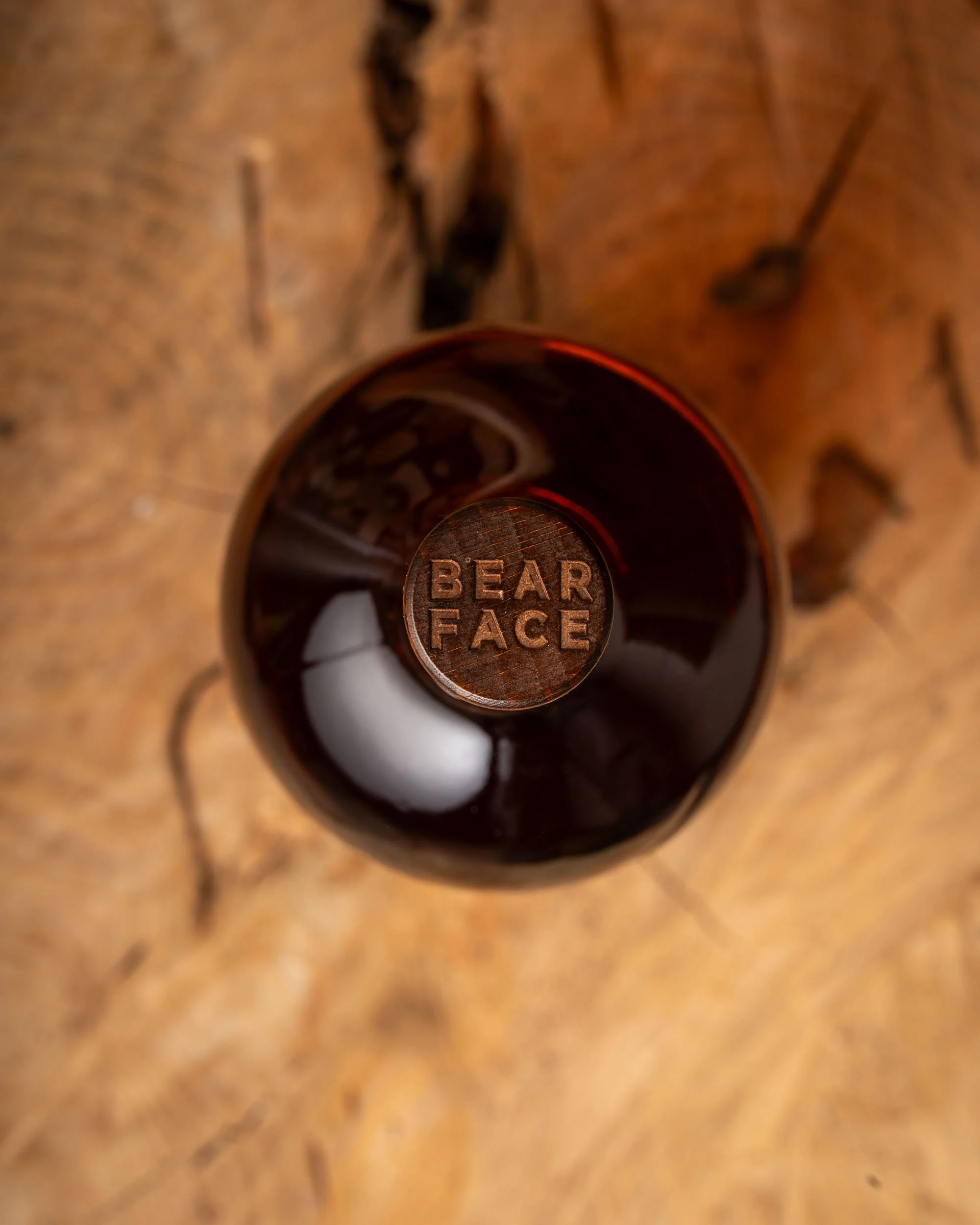Looking down on a bottle of Bearface Triple Oak