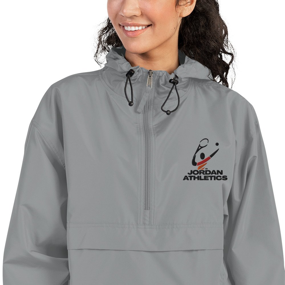 embroidered-champion-packable-jacket-graphite-zoomed-in-666be2d7d2709.jpg