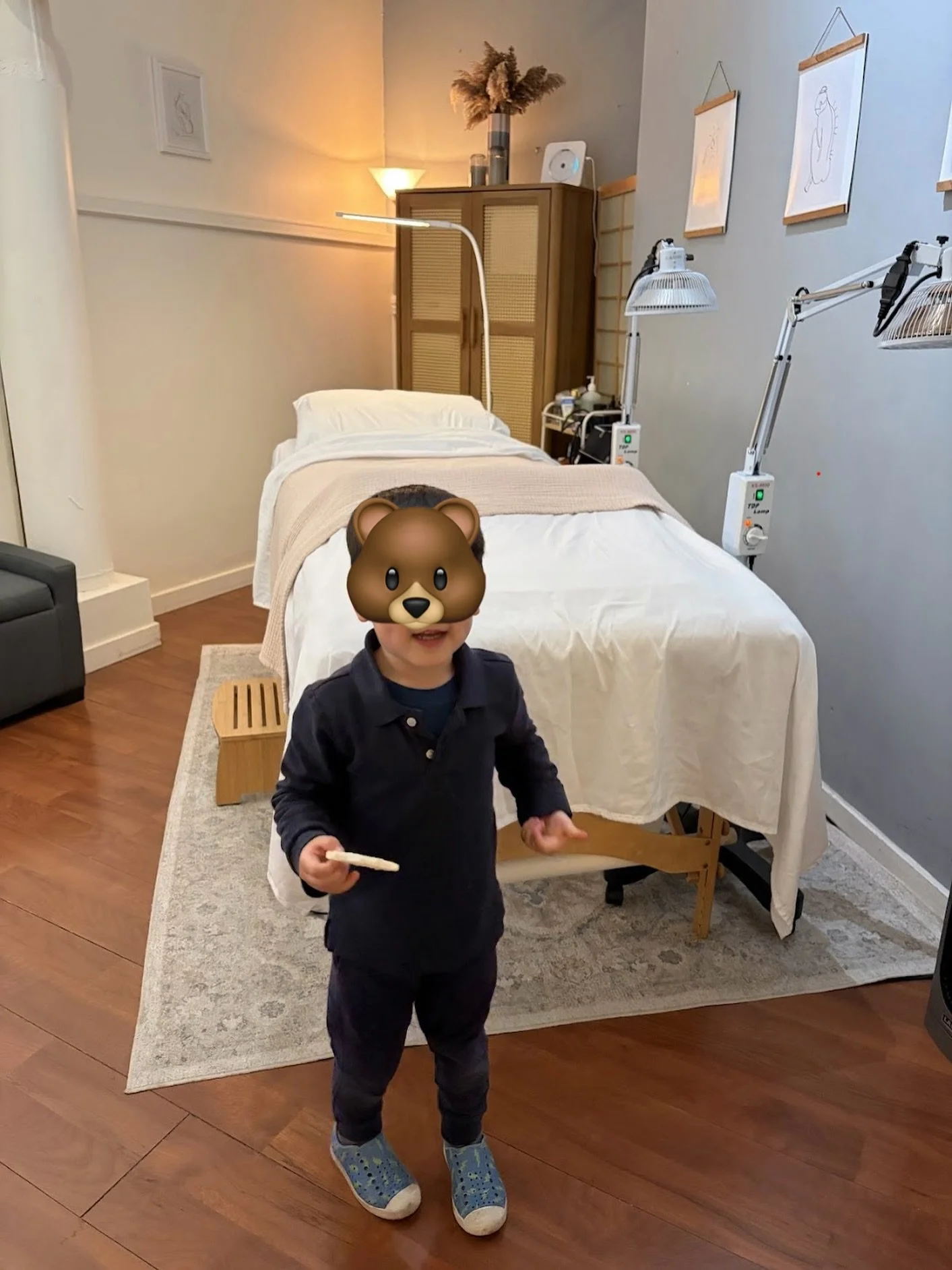 School&rsquo;s out. Schedules shift. Child care gets creative.

Sometimes the clinic has a small visitor (my kiddo). He approves of the treatment room (thumbs up). He&rsquo;s also mid-snack, so his review may be biased.
Summer has a way of reshufflin