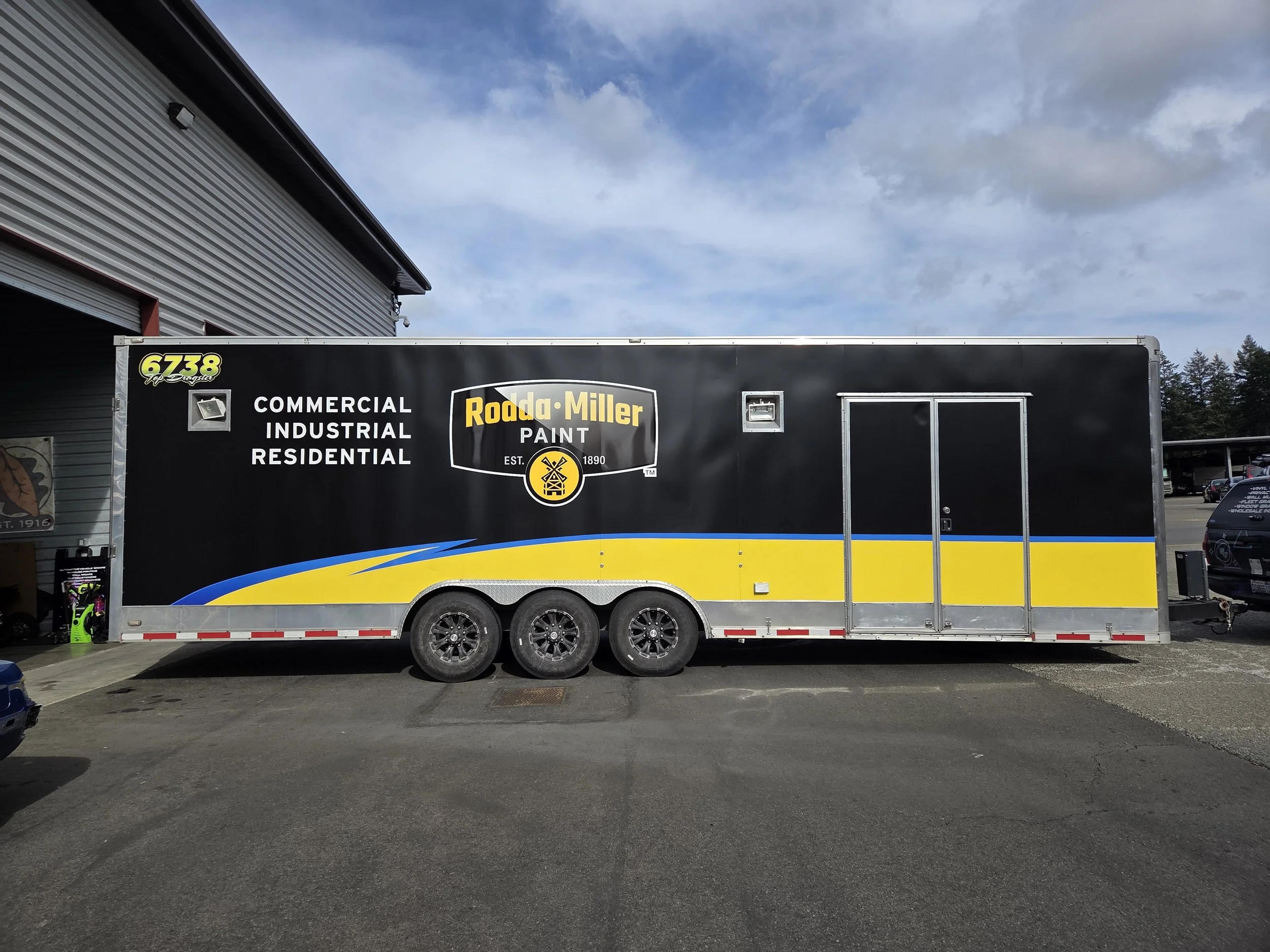 Trailer #2 wrapped in satin black with printed Rodda miller graphics 