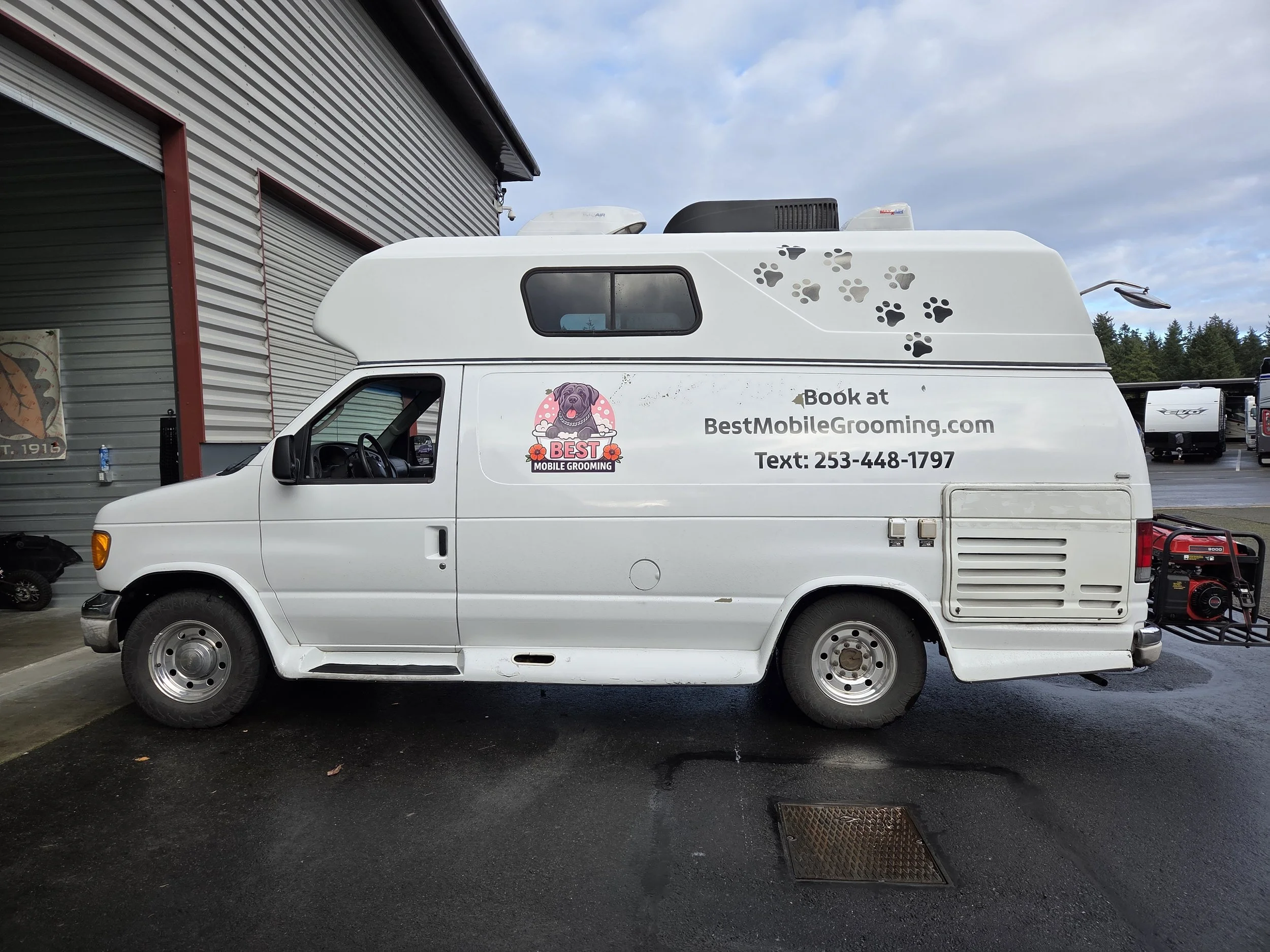Printed and installed Spot Graphics for our  looking mobile grooming!