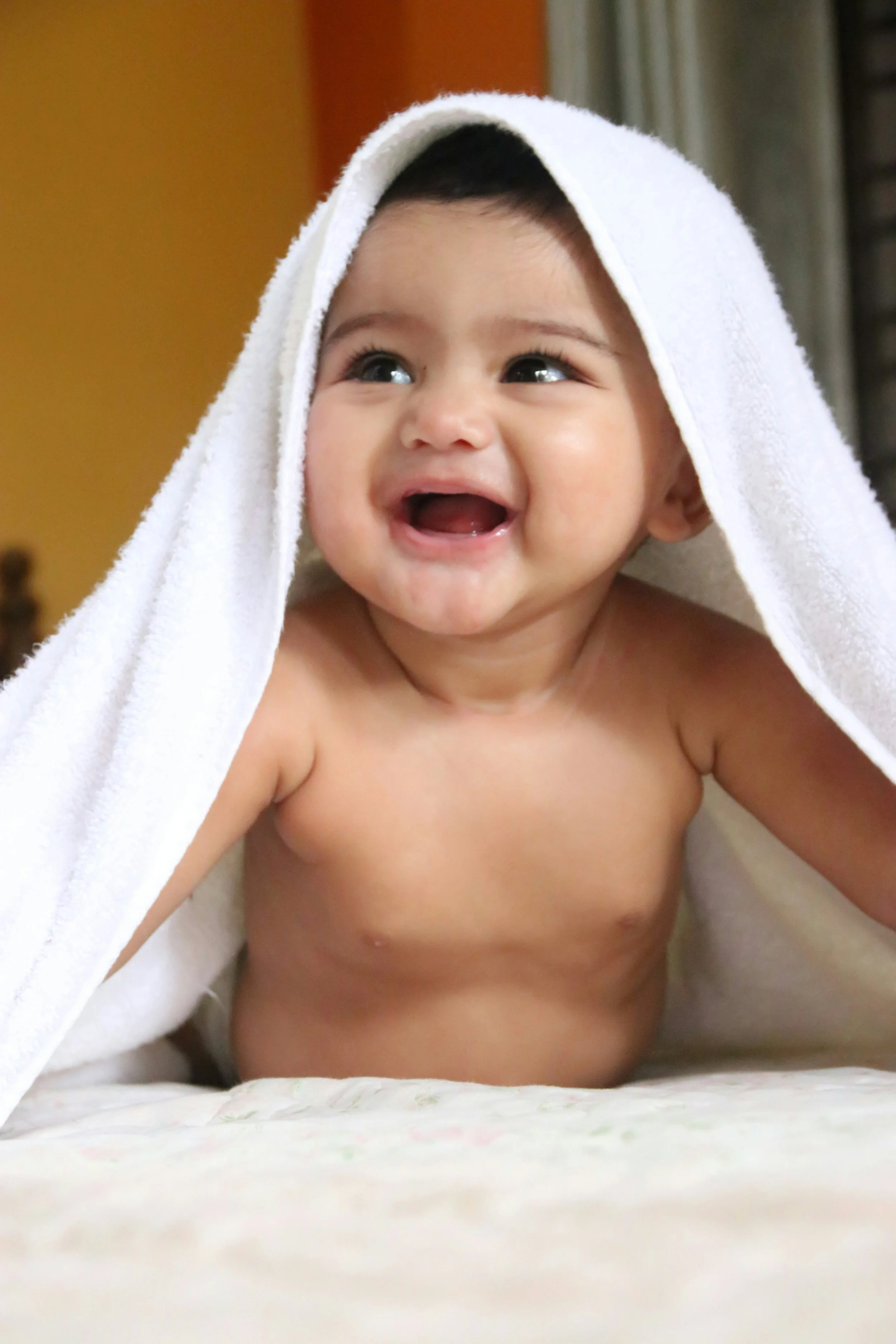 Happy baby healed from baby eczema. Homeopathic treatment.