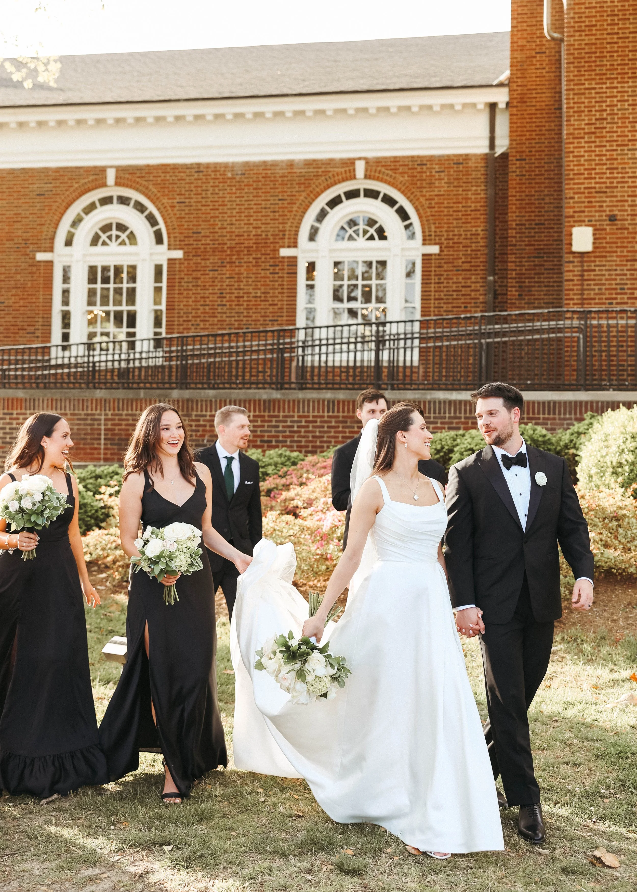Kentucky bride holding her bouquet of flowers while taking her bridal portraits.