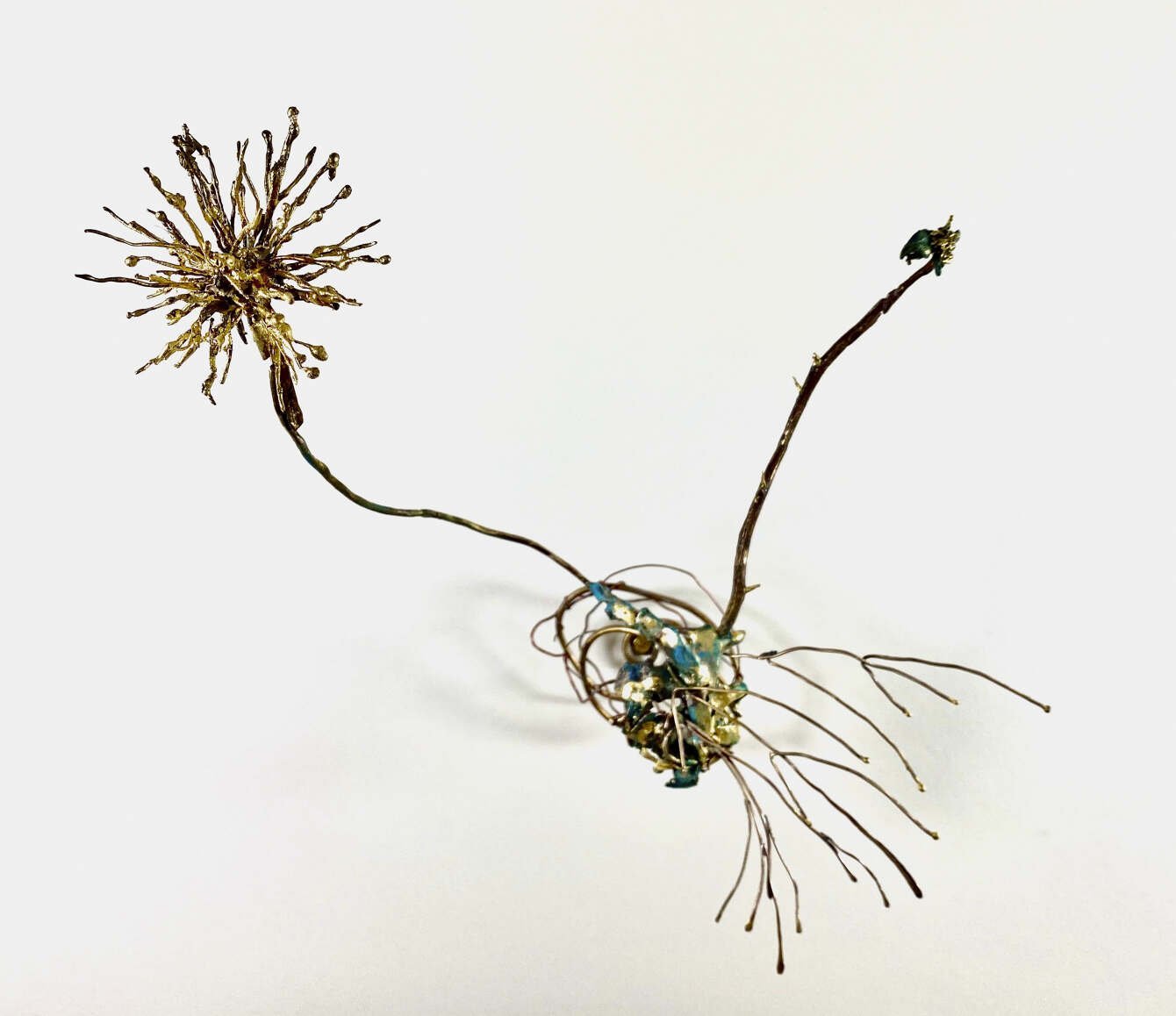 Blowin’,
Cast bronze thistle, thorns, hand-made spring, patina, gold, 2022
9 x 11 x 9 inches