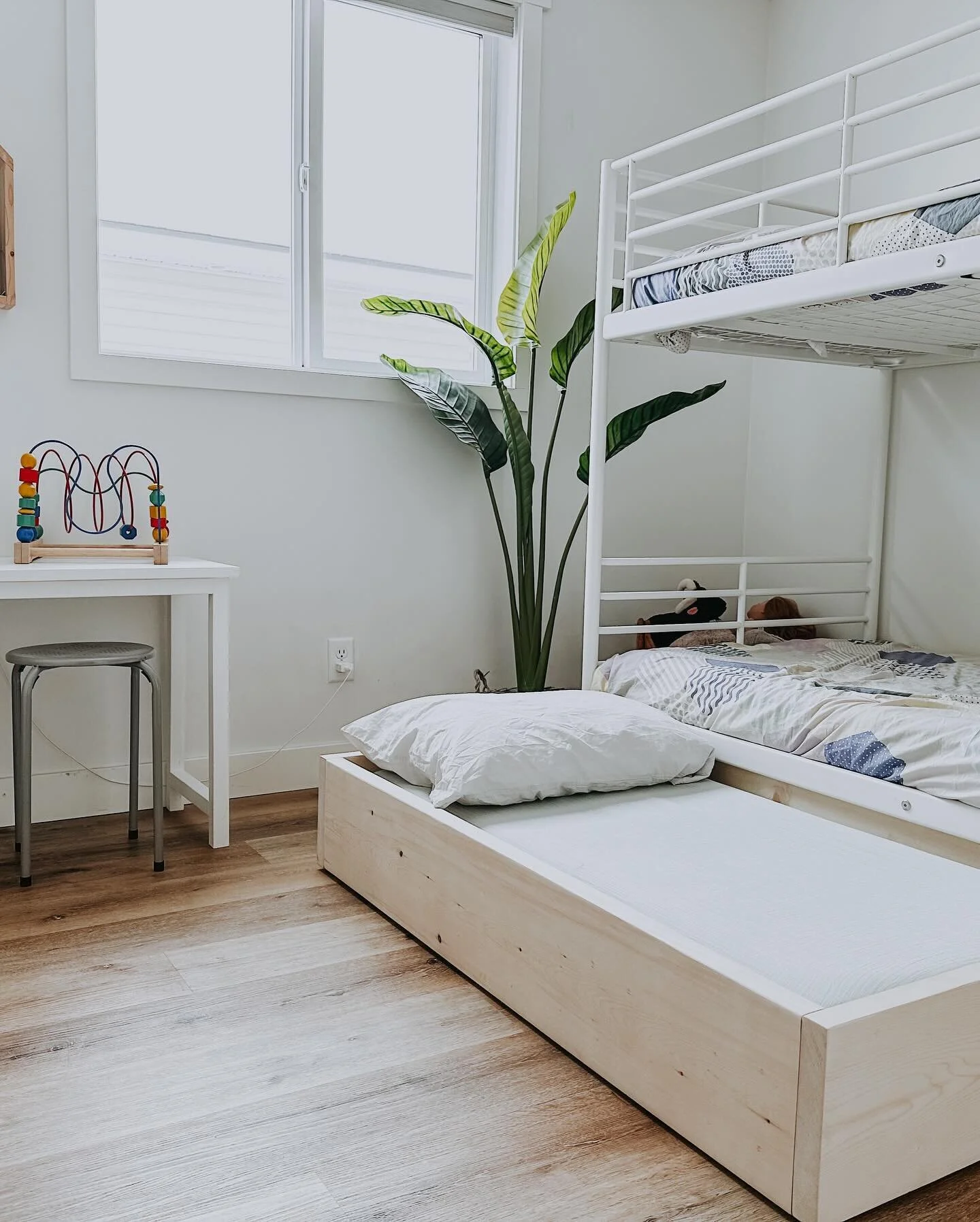 Latest little project. My oldest son and I built a beautiful floor bed for Barrett. He had outgrown his mini crib so it was time for a room refresh and a big boy bed. With this room being the smallest in the house, while also housing the most childre