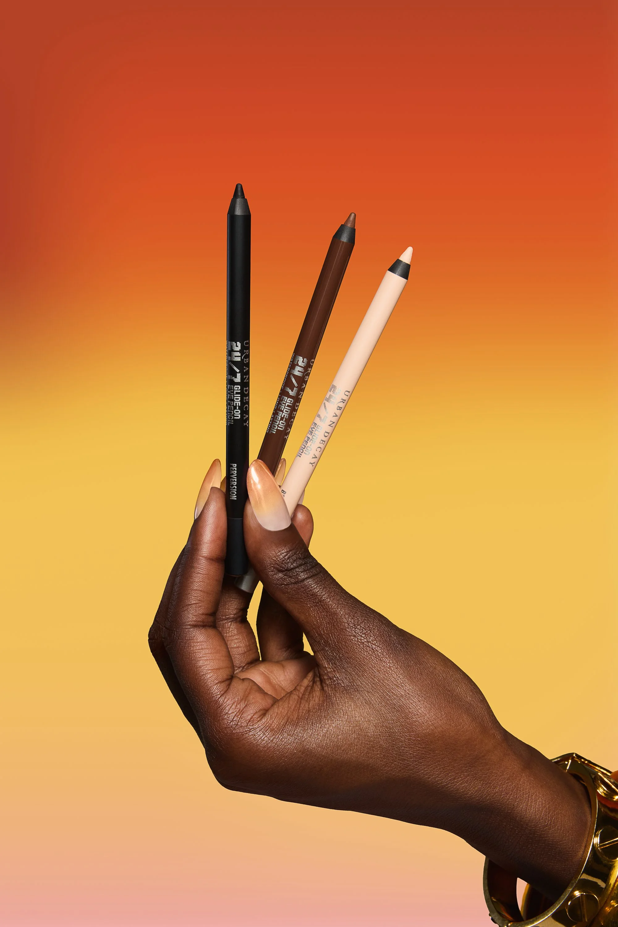 UD-2025-HOLIDAY-GOLDEN-HOUR-PRODUCT-IN-HAND-247-PENCIL-NYAWUTA - RGB.jpg