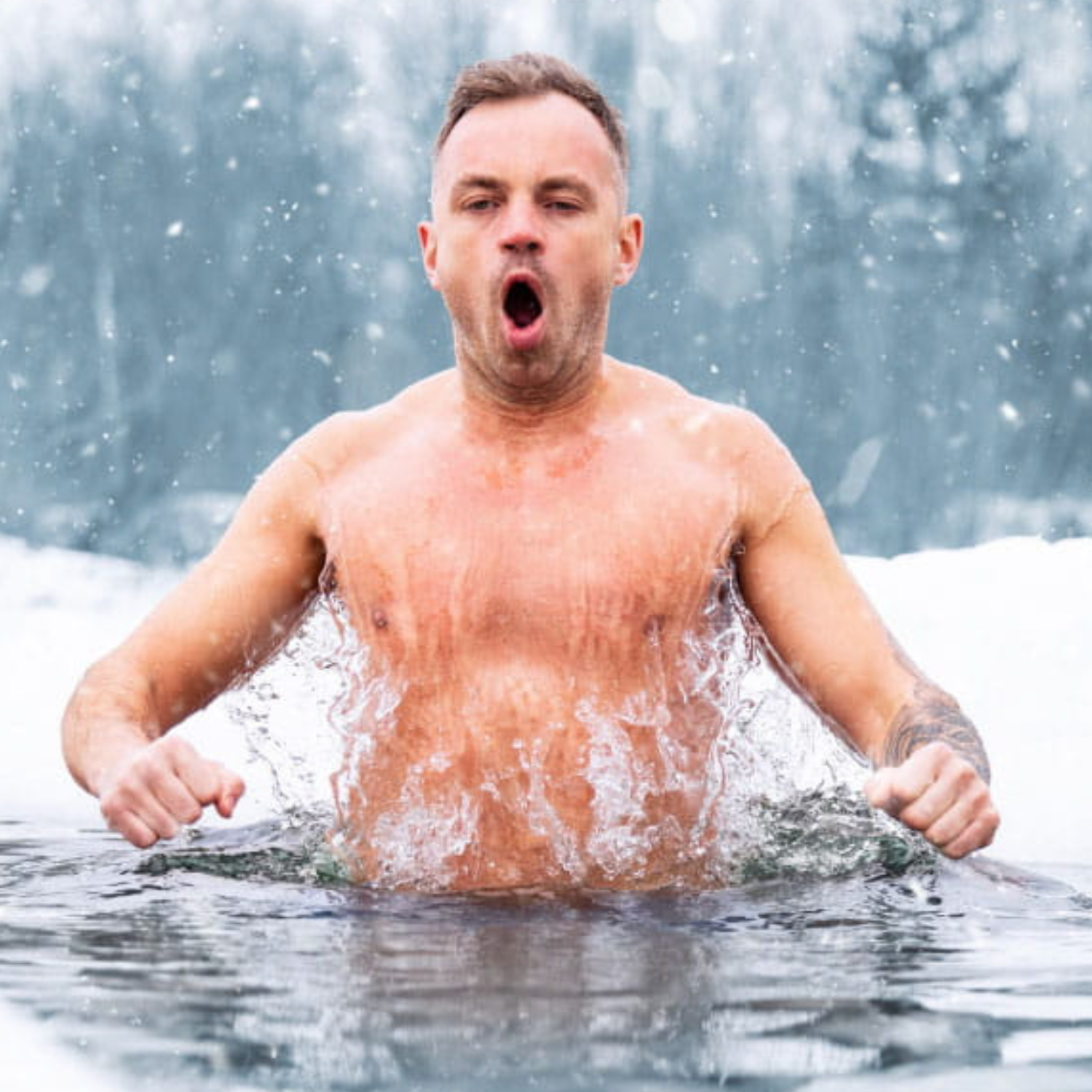 Man jumping into cold water pool in the snow