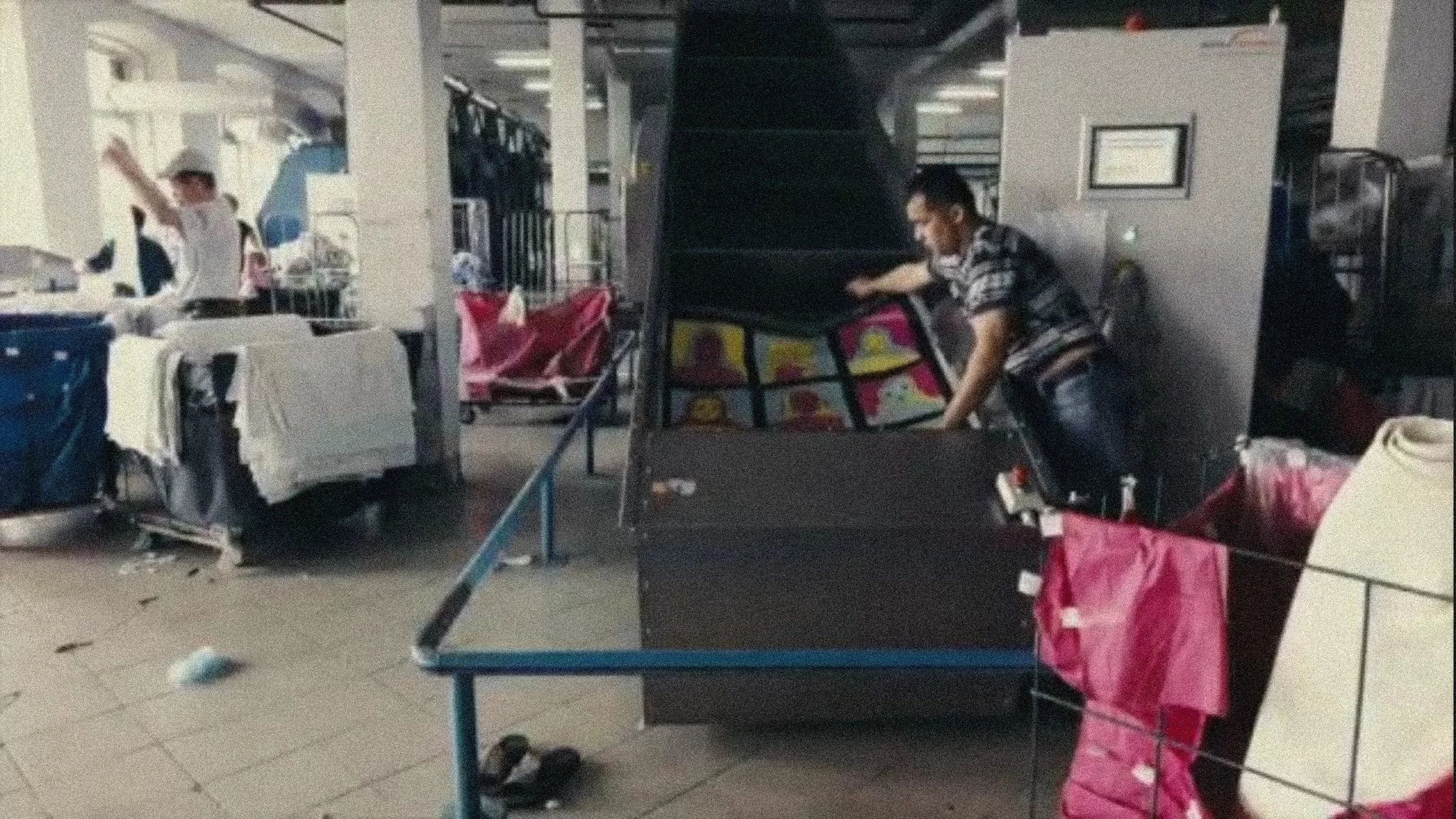 Laundry (still), 2026. Video research — 8 min., 40 sec. "Laundry" works with found footage to make invisible labor visible, tracing how washing is represented across cultures — from domestic rituals to the large industrial laundries of Mumbai. The wo