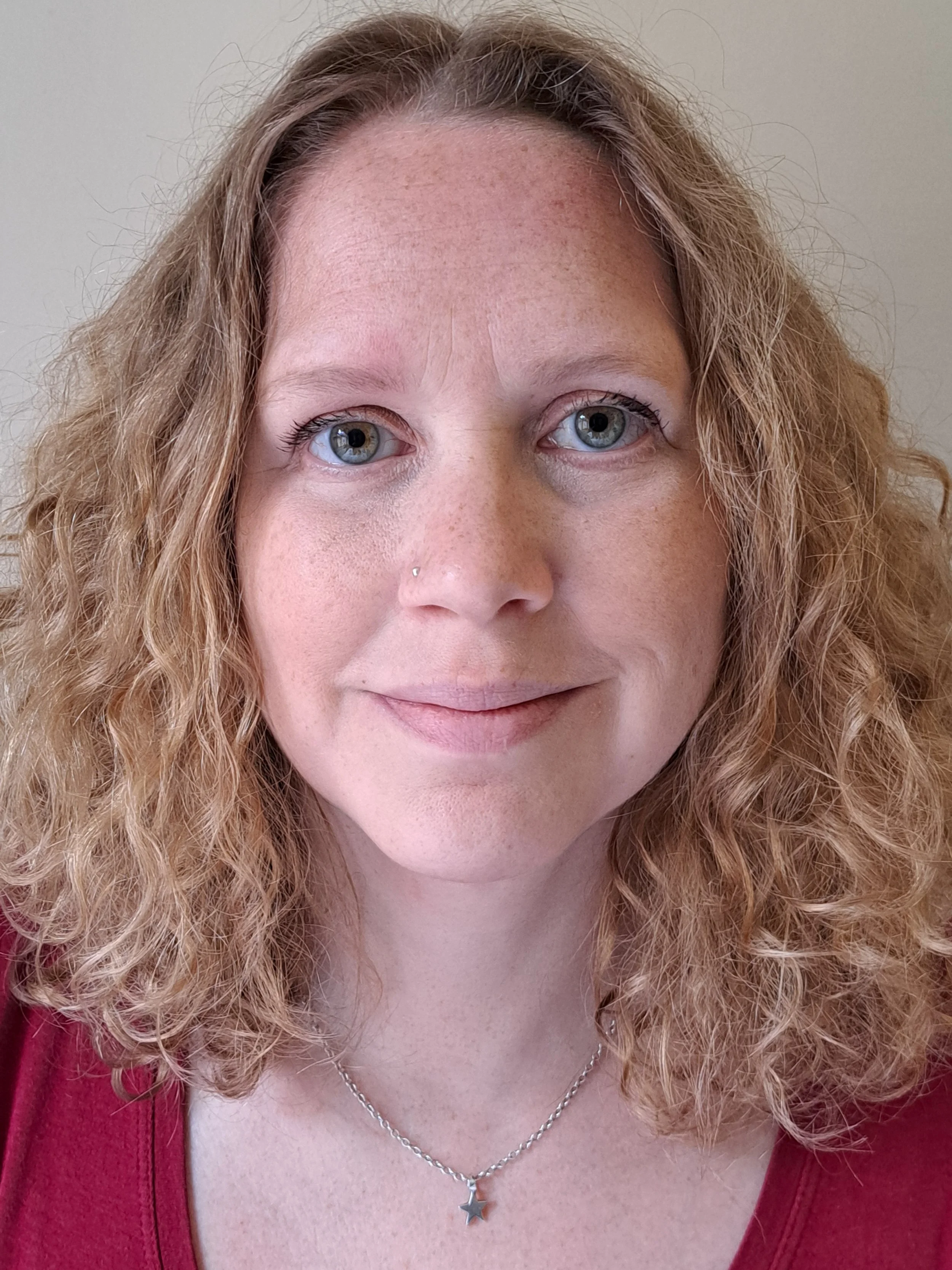 Head shot photo of Jen Fash smiling