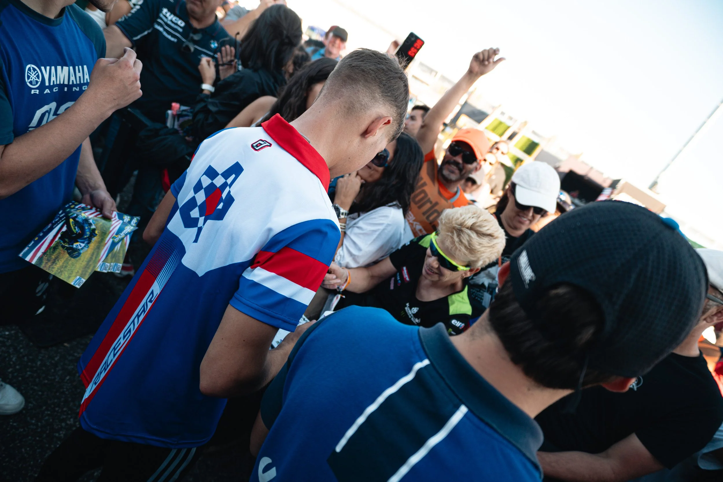 Lukacs Owen signing autographs at the WorldSBK Paddock Show