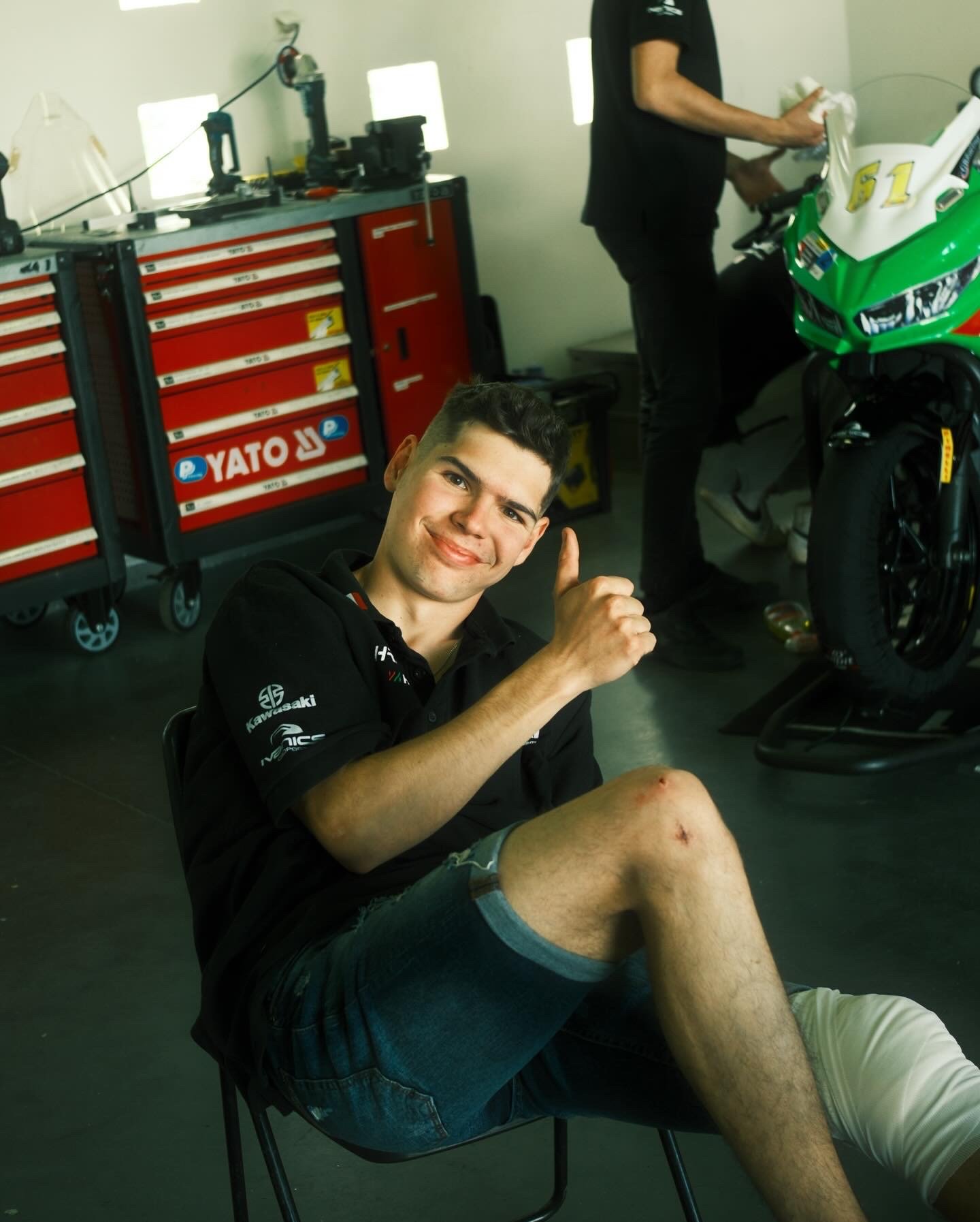 Lukacs Owen giving a thumbs up after injury returning from hospital