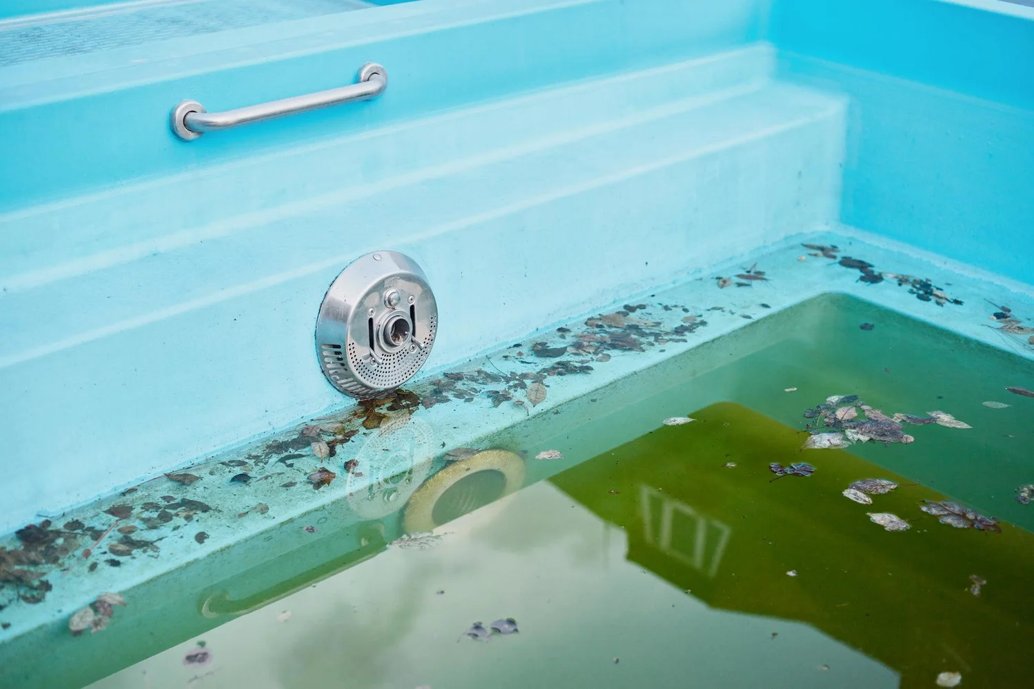 Close-up of water in an outdoor pool in spring