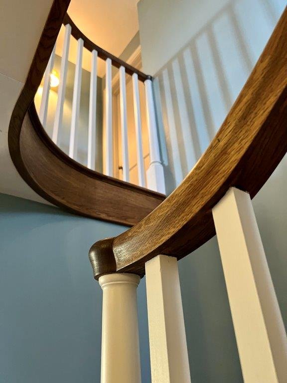 Curved balustrade handrail and landing panel.jpg