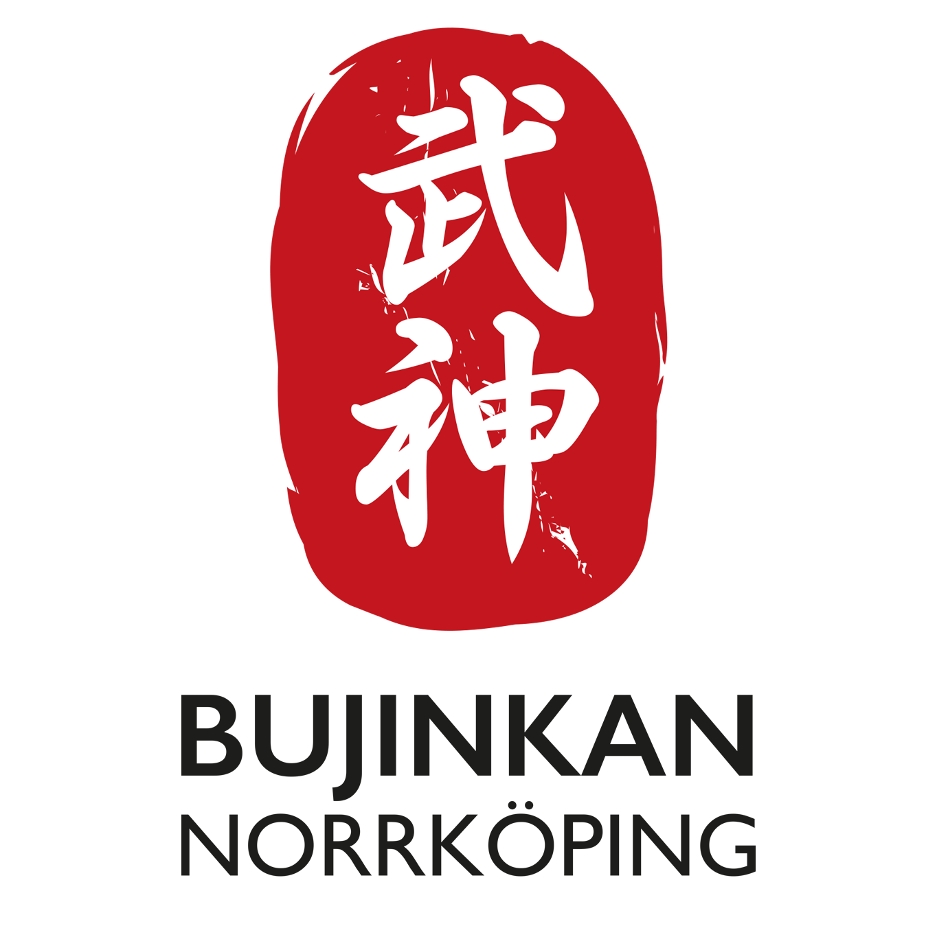 En röd oval form med vita kinesiska tecken och texten Bujinkan Norrköping under.