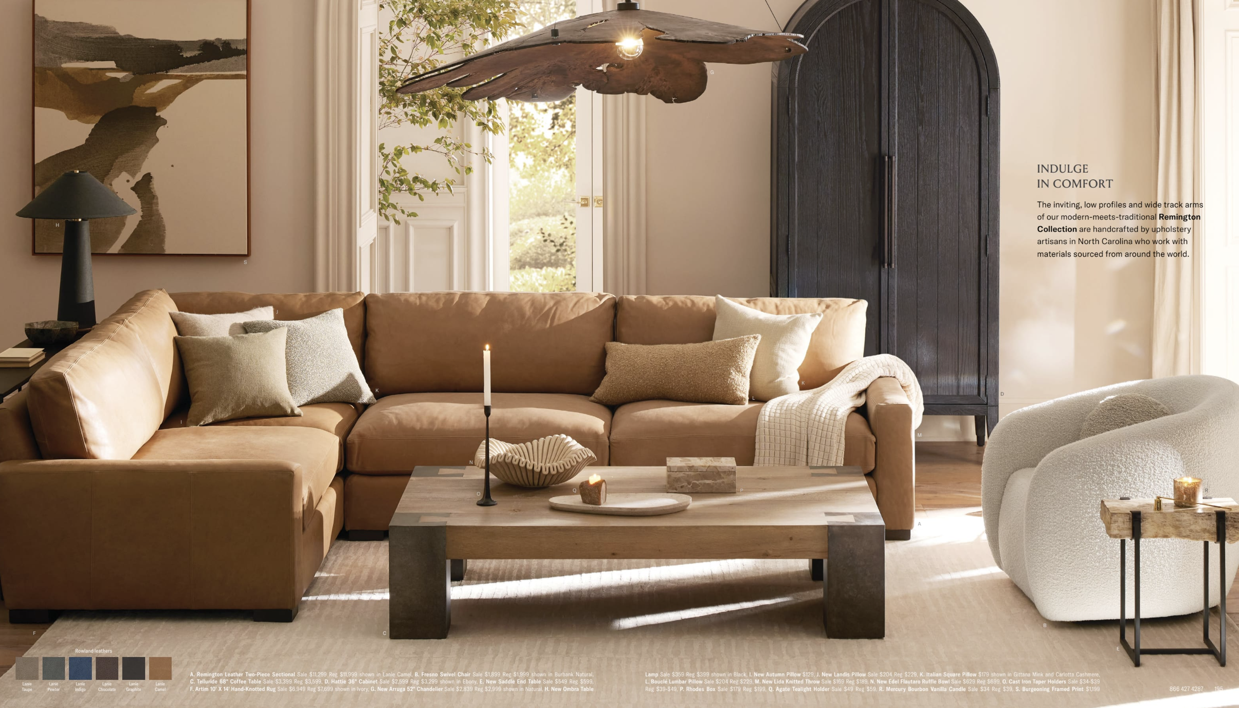 Arhuas 2024 Fall Catalog -- photo shows an acorn brown sectional couch under a large pendant light. Artwork hangs on the wall behind the couch, and a cream colored pouf side chair sits across from it. A cozy scene is captured with a large taper candl