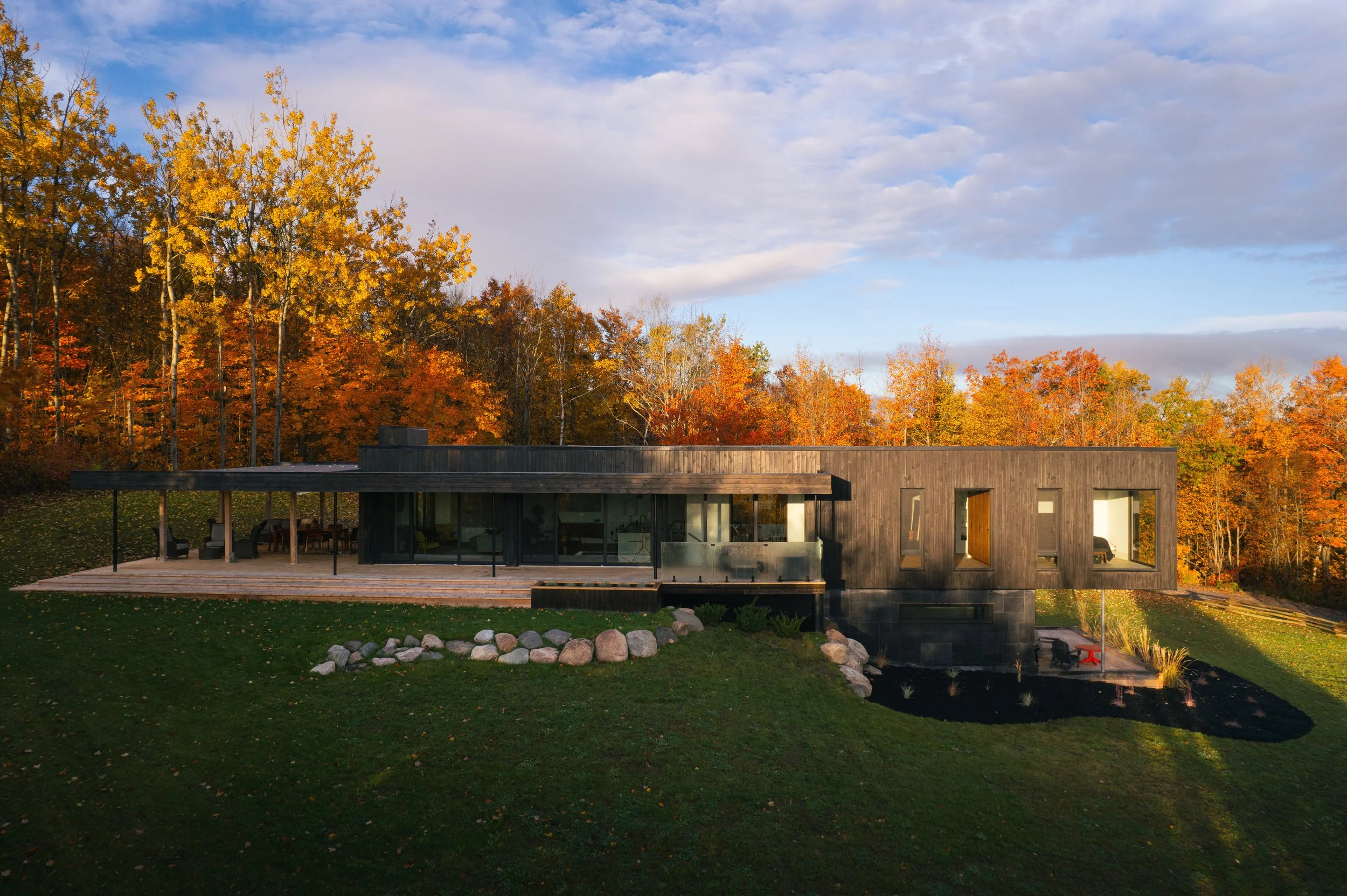 Daytime exterior wide shot of modern house