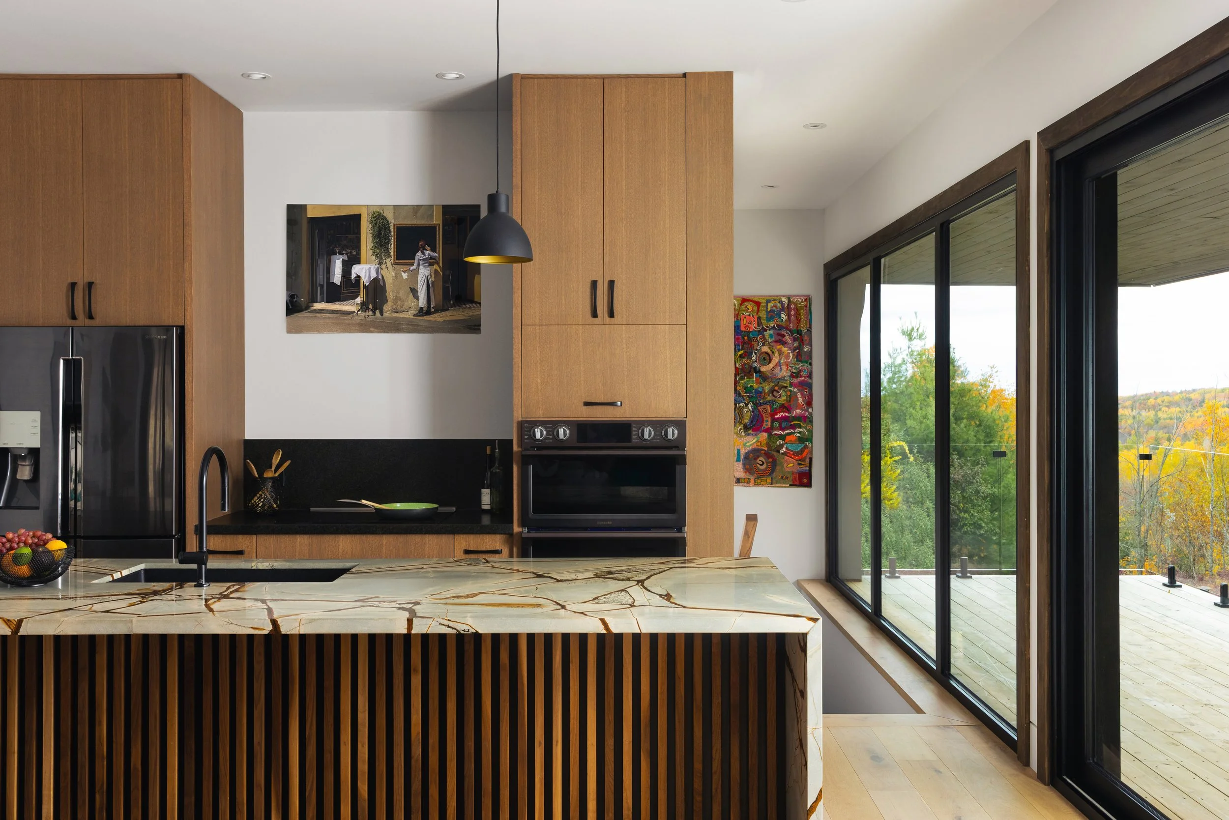 Modern kitchen with floor to ceiling windows