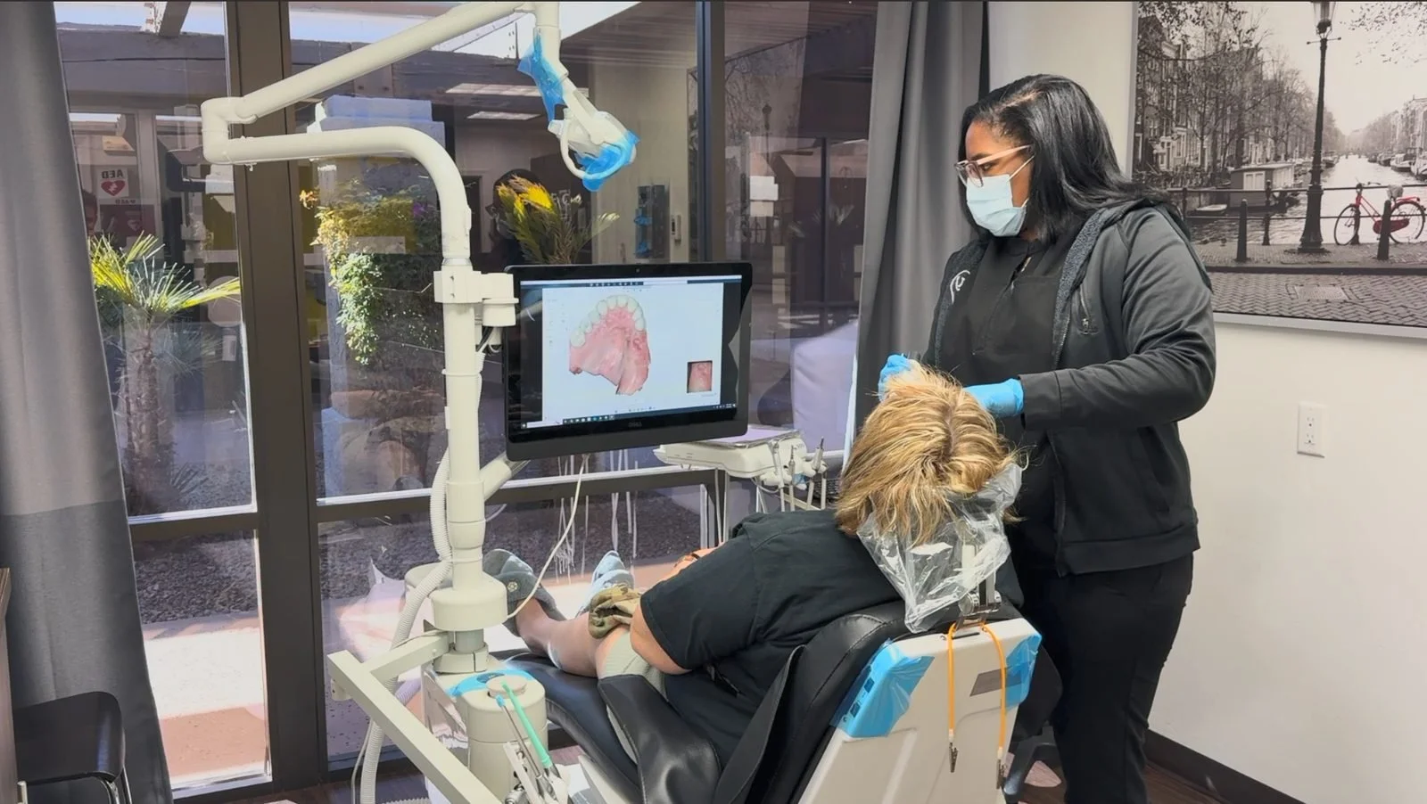 Patient receiving a digital intraoral scan for a 3D dental impression at Tooth Corps in Peoria, Arizona