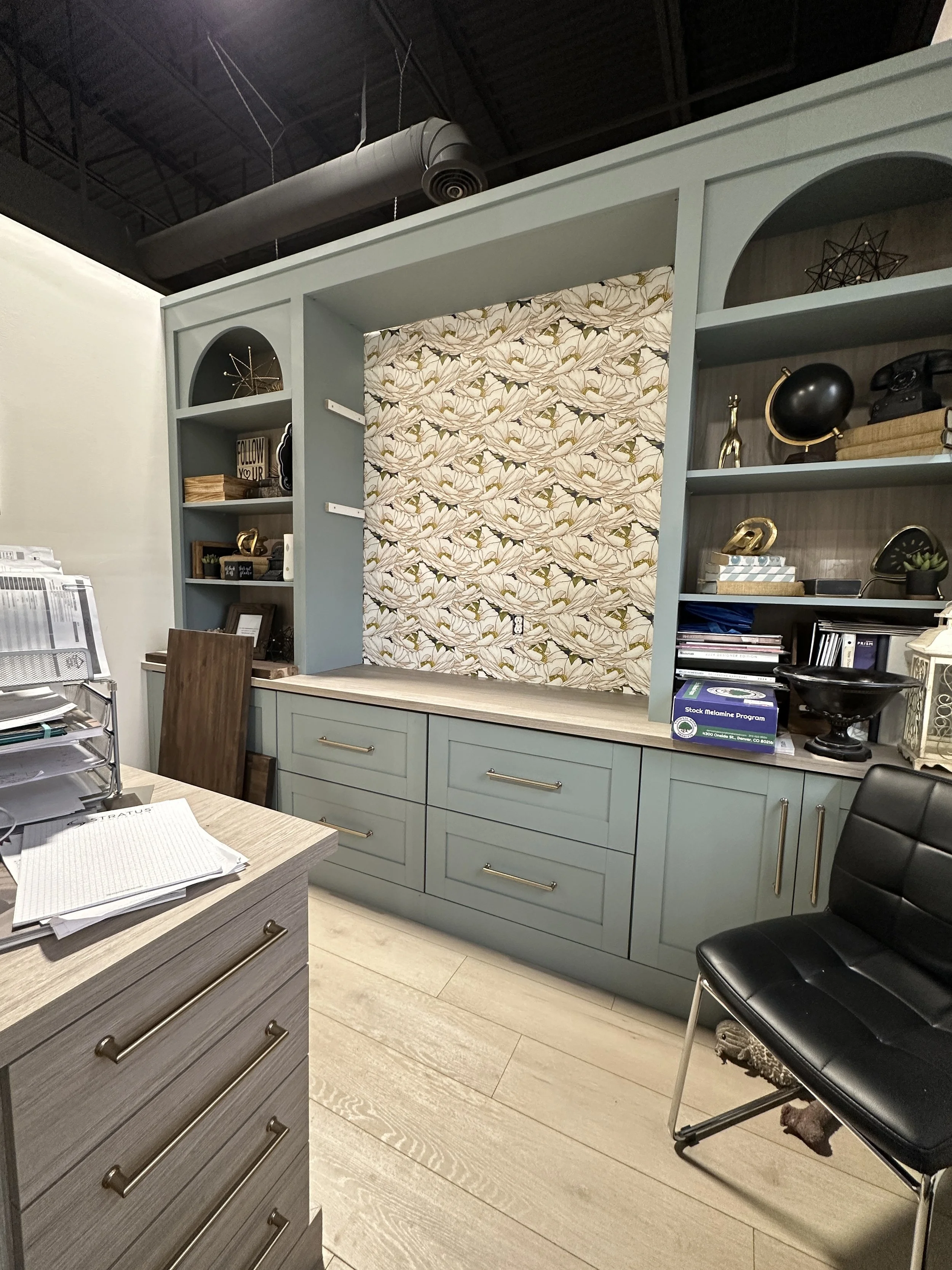 The view from Michelle's desk
As the wallpaper dried, Michelle decided she wanted new shelving for the space