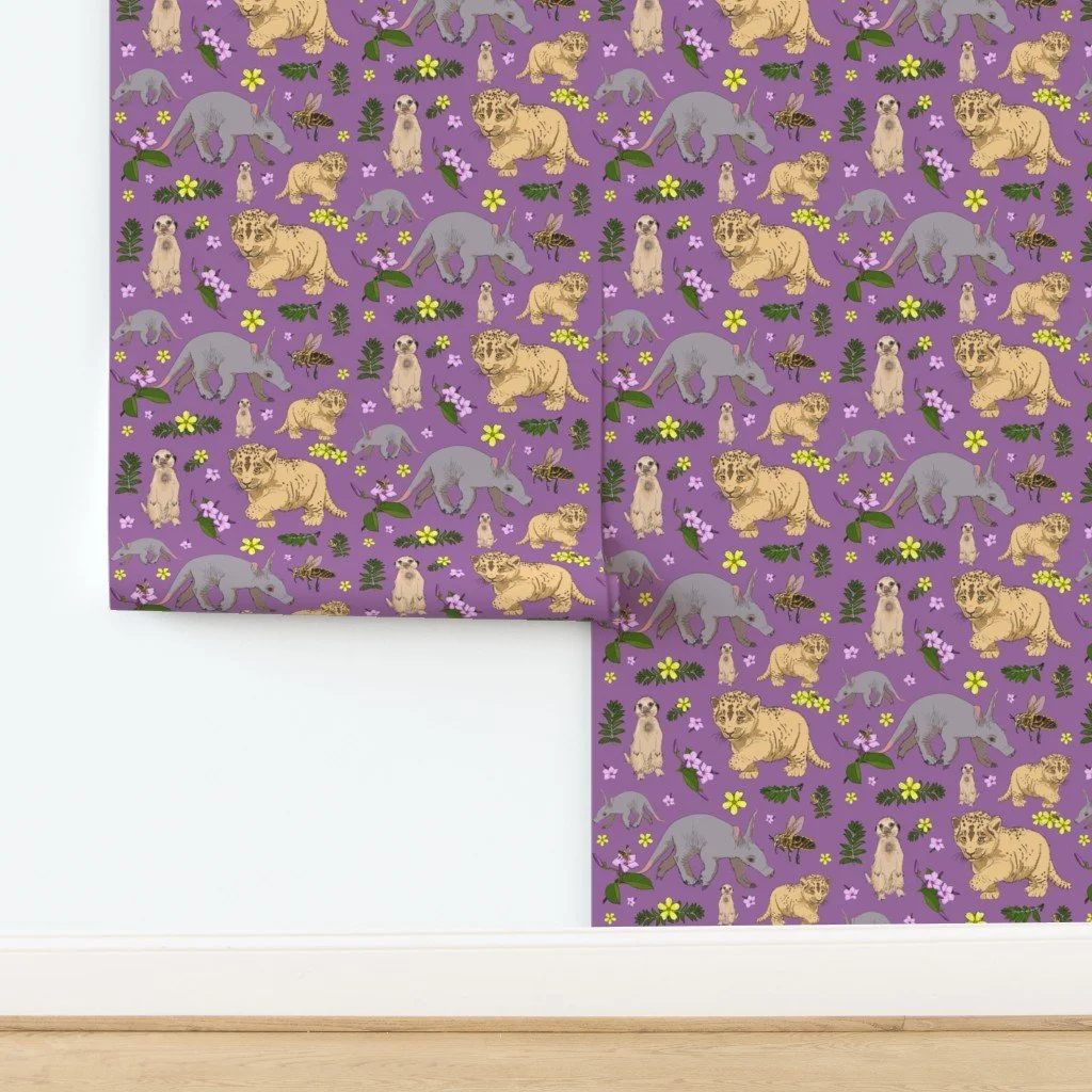 Illustration of meerkats, lion cubs, aardvarks, bees, and flowers on a purple background.