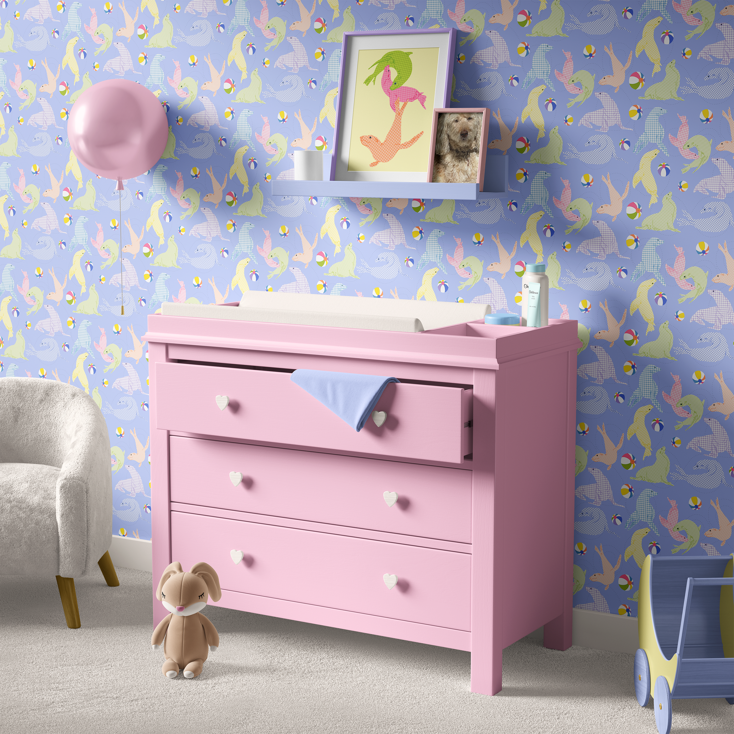 A nursery chest with changing top and Happy Haven Seals At Play on Wave Crest Blue