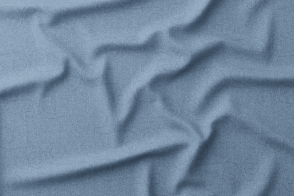 Background pattern with blue spirals on light blue surface.