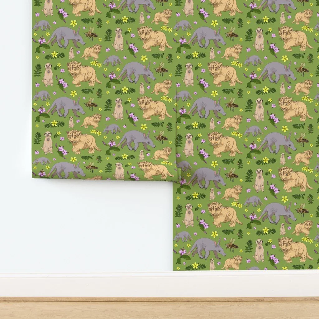 Illustration of animals and flowers on green background, featuring meerkats, leopard cubs, aardvarks, and bees with yellow and purple flowers.