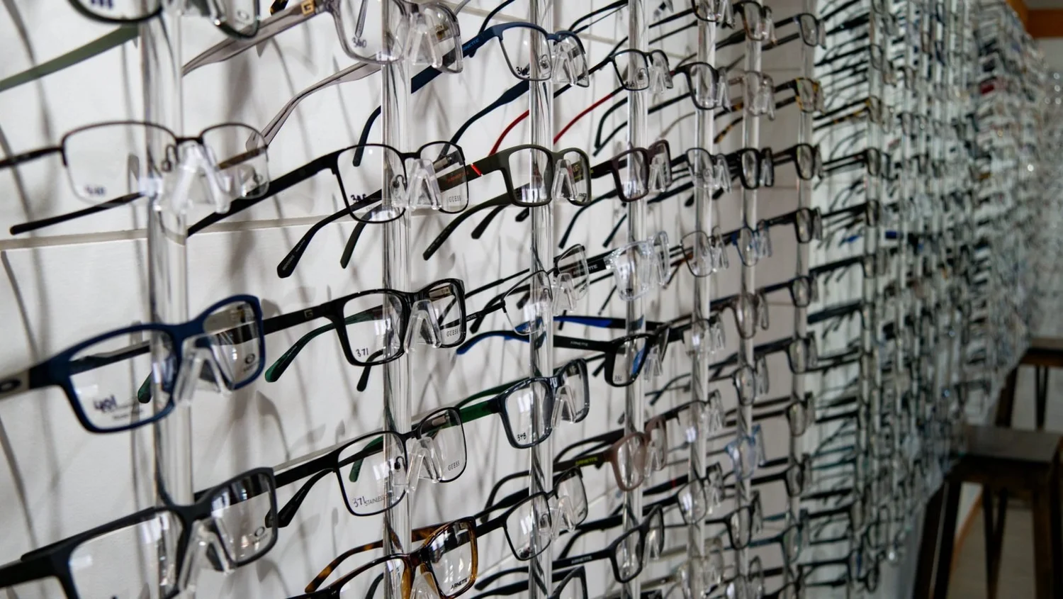 Designer eyeglass frame wall at Anderson Family Vision optical shop in Bozeman MT