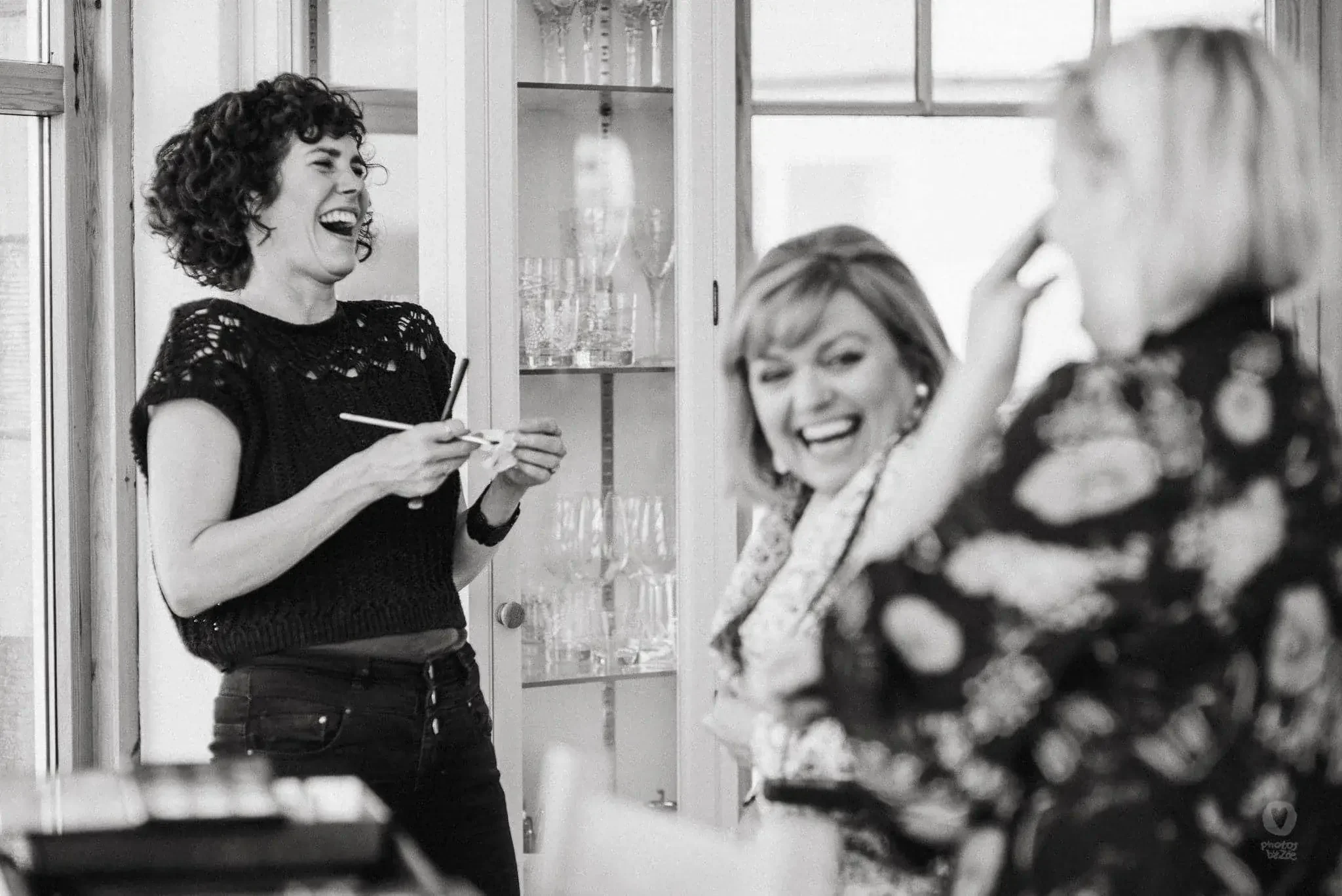 Mobile Makeup Artists Edinburgh -Sharon and Monica laugh with the Mother-of-the-bride whilst applying her hait and makeup