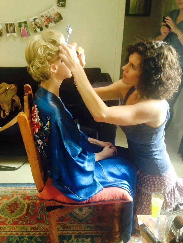 Sharon of The Made Up Team applying bridal makeup in Edinburgh