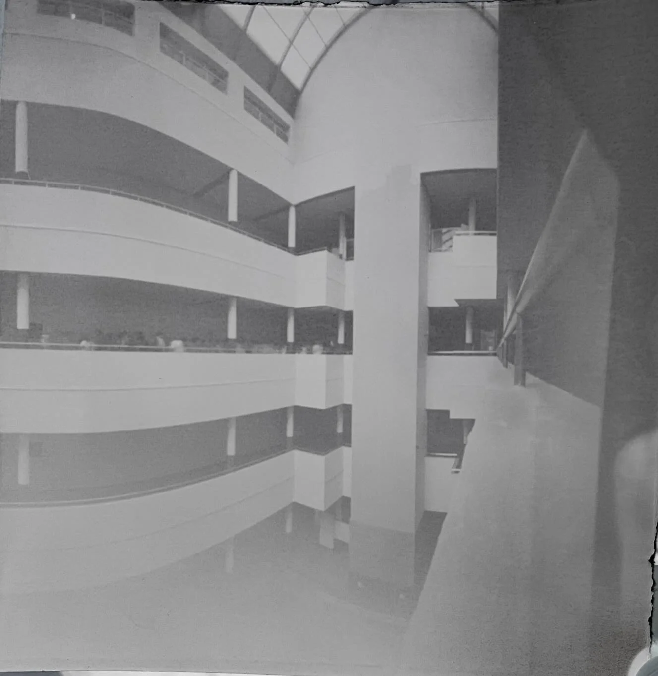 Pinhole camera pictures from my time in India! The interior of a building on the Manipal Academy of Higher Education campus, a courtyard of the MAHE campus, the beach (with tiny palm trees), and an outdoor pavilion. I&rsquo;m so glad they worked. Suc