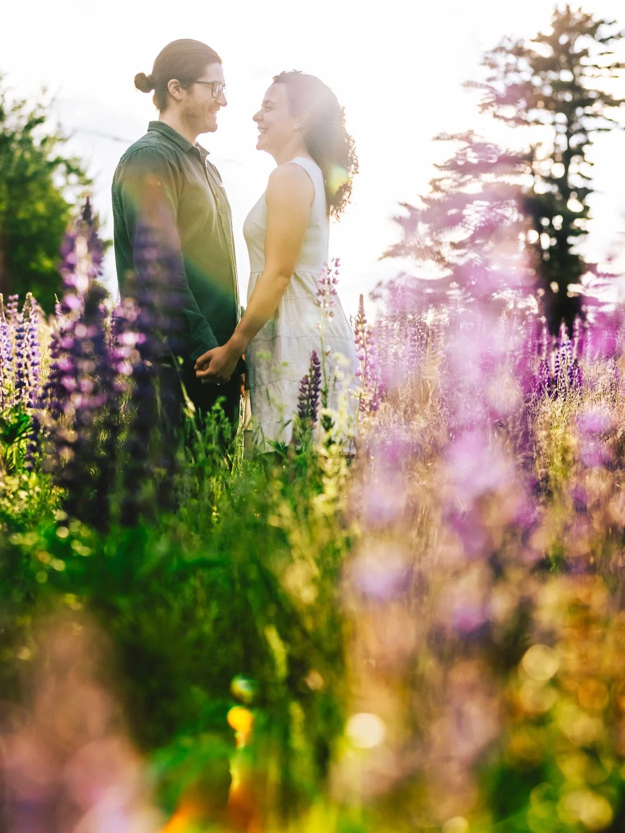 Peak lupine season in New Hampshire only lasts for a few short weeks, so when Tina suggested planning their engagement session around the bloom, I was all in.

Between the wildflowers, @cannonmountain , and the White Mountains backdrop, this session 