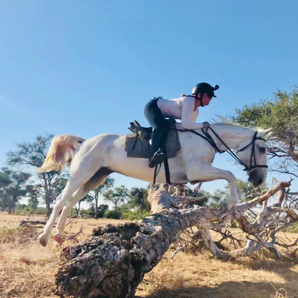 Bridget & Luna jumping in Botswana