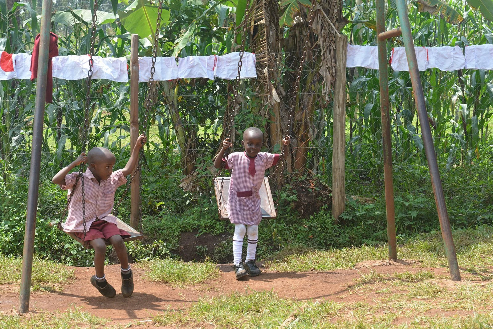 blair-in-kenya-swingsets.jpg