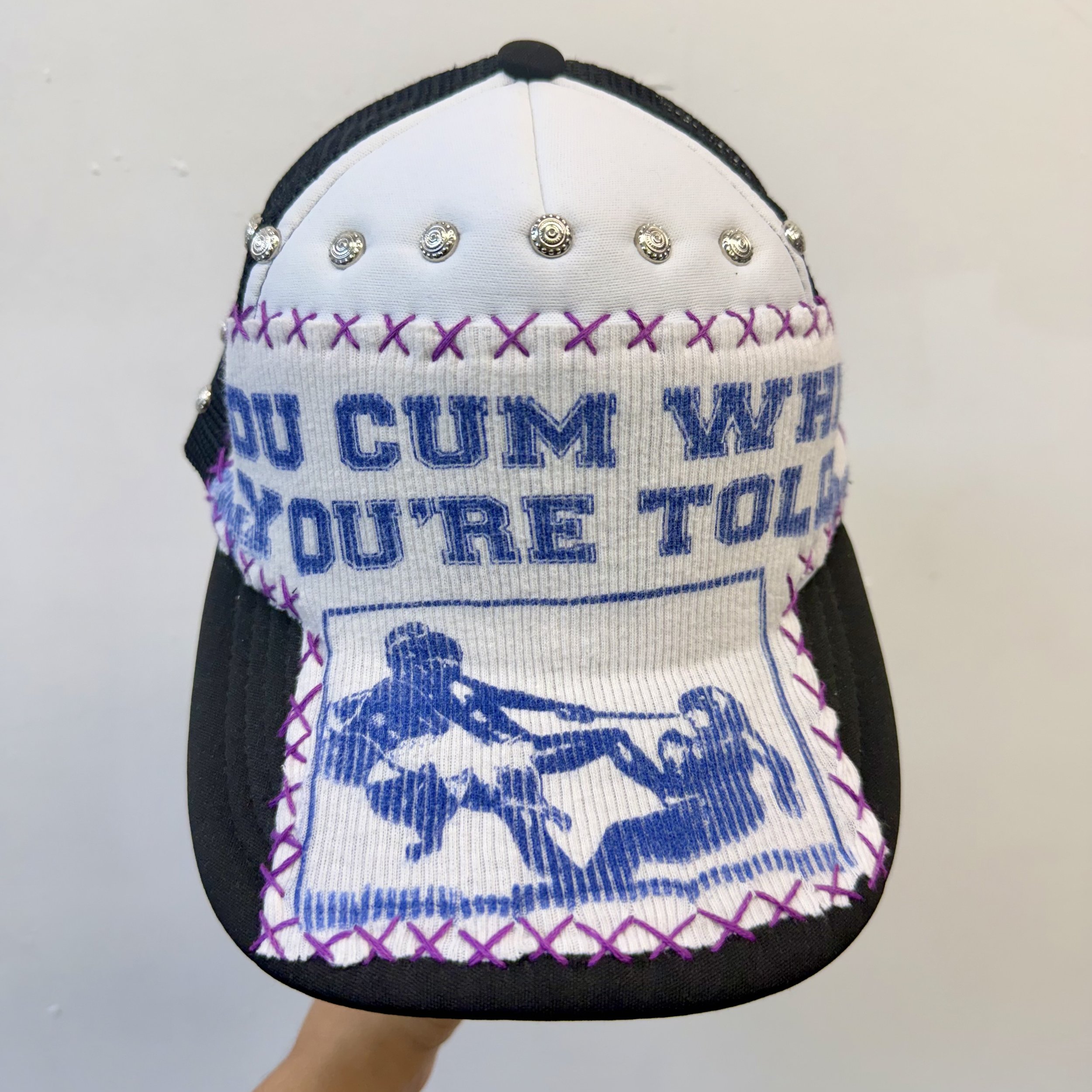 "when you're told.." trucker hat!