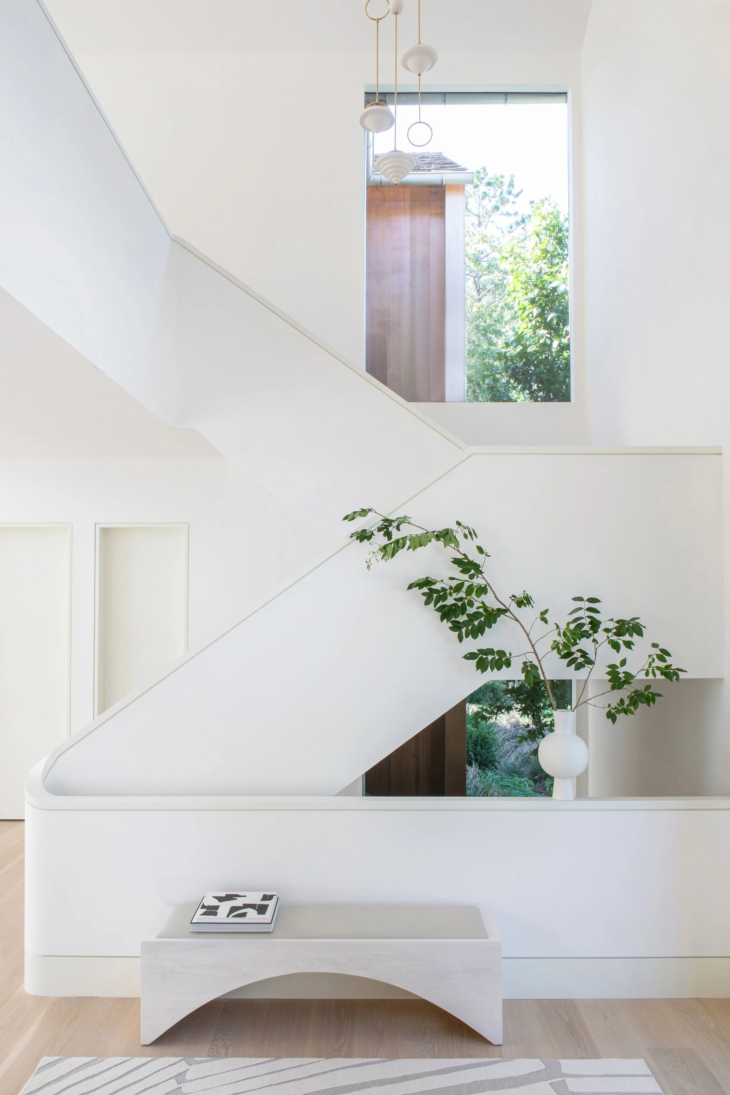 06.+Hamptons+Modern+by+Chango+&+Co.+-+Stairway+with+Light+Fixture.jpg