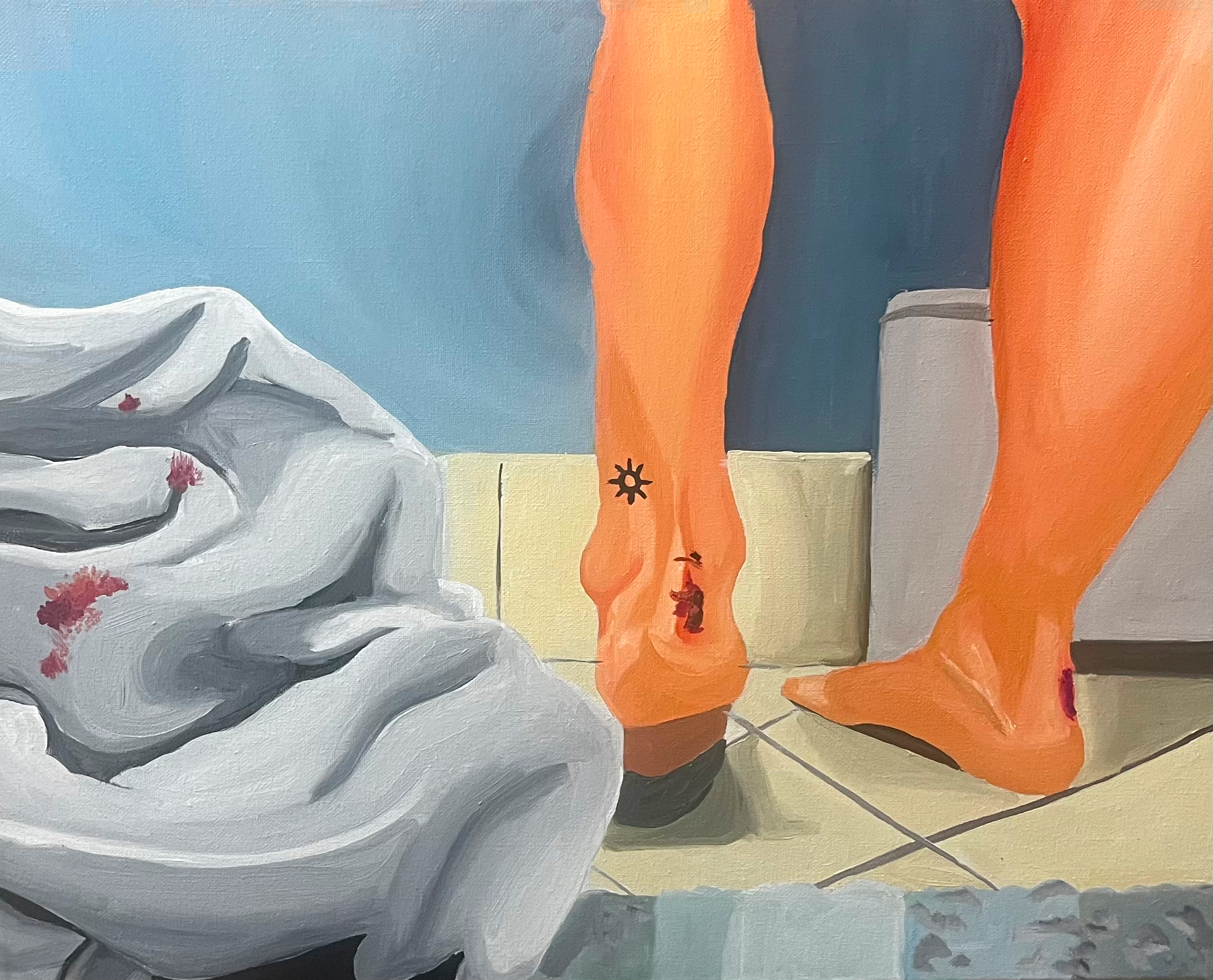 Close-up of person's legs wearing orange pants and gray slippers, with a white messy blanket on the tiled floor. The background has a blue wall and part of a yellow cupboard.