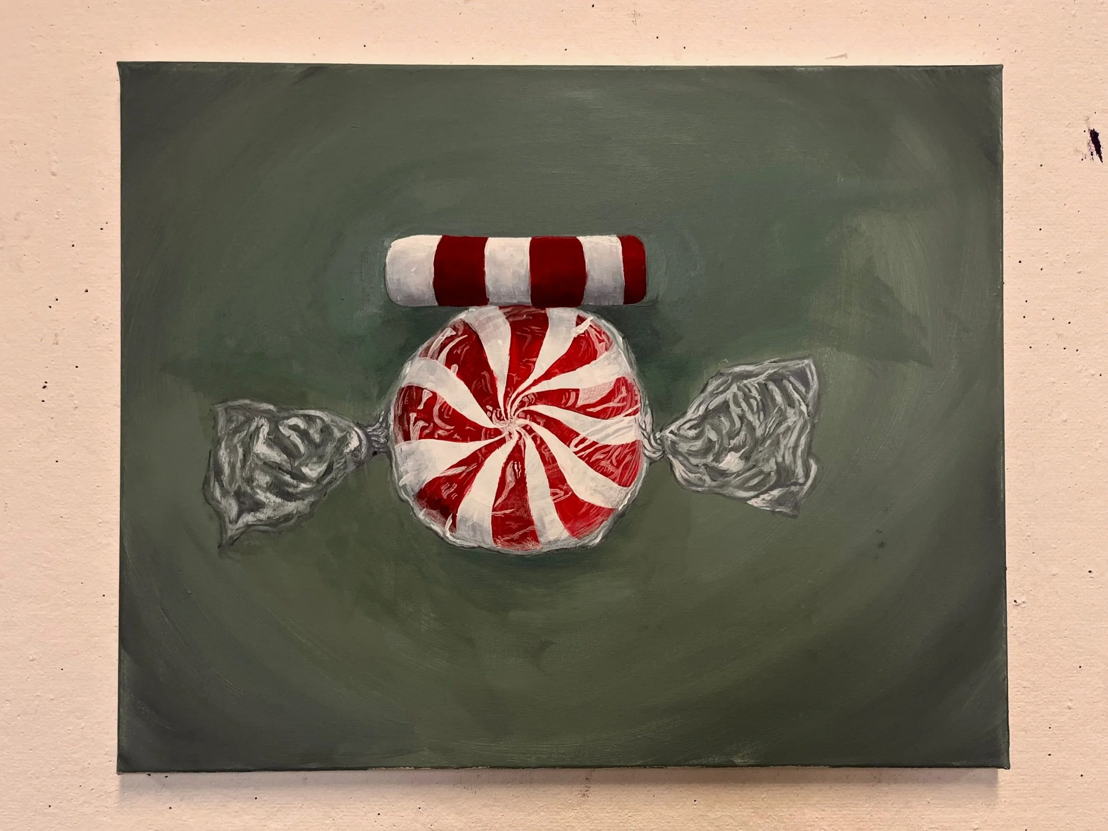 "Peppermint Portrait" // Acrylic paint on canvas // 16" X 20" // 2023 // Objects are arranged to imitate human disposition. Through blurred vision, the top candy transforms into a colorful hat.