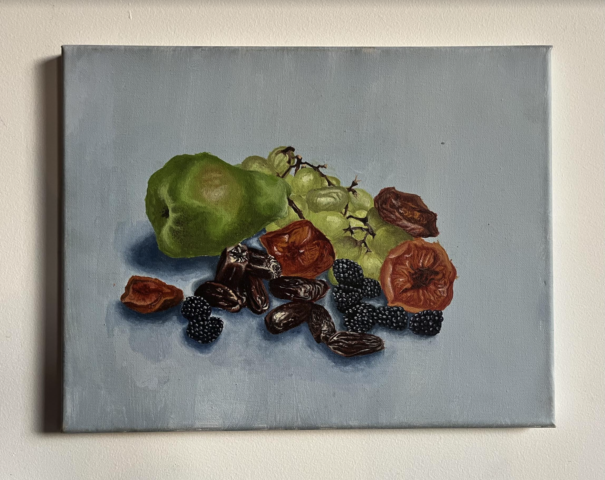 "תמר/Tamar" // Acrylic paint on canvas // 14" X 11" // 2024 // A still life of various fruits, paying homage to tamar, the Hebrew word for the date fruit: one of the biblical Seven Species (Shiv’at HaMinim) of the Promised Land.