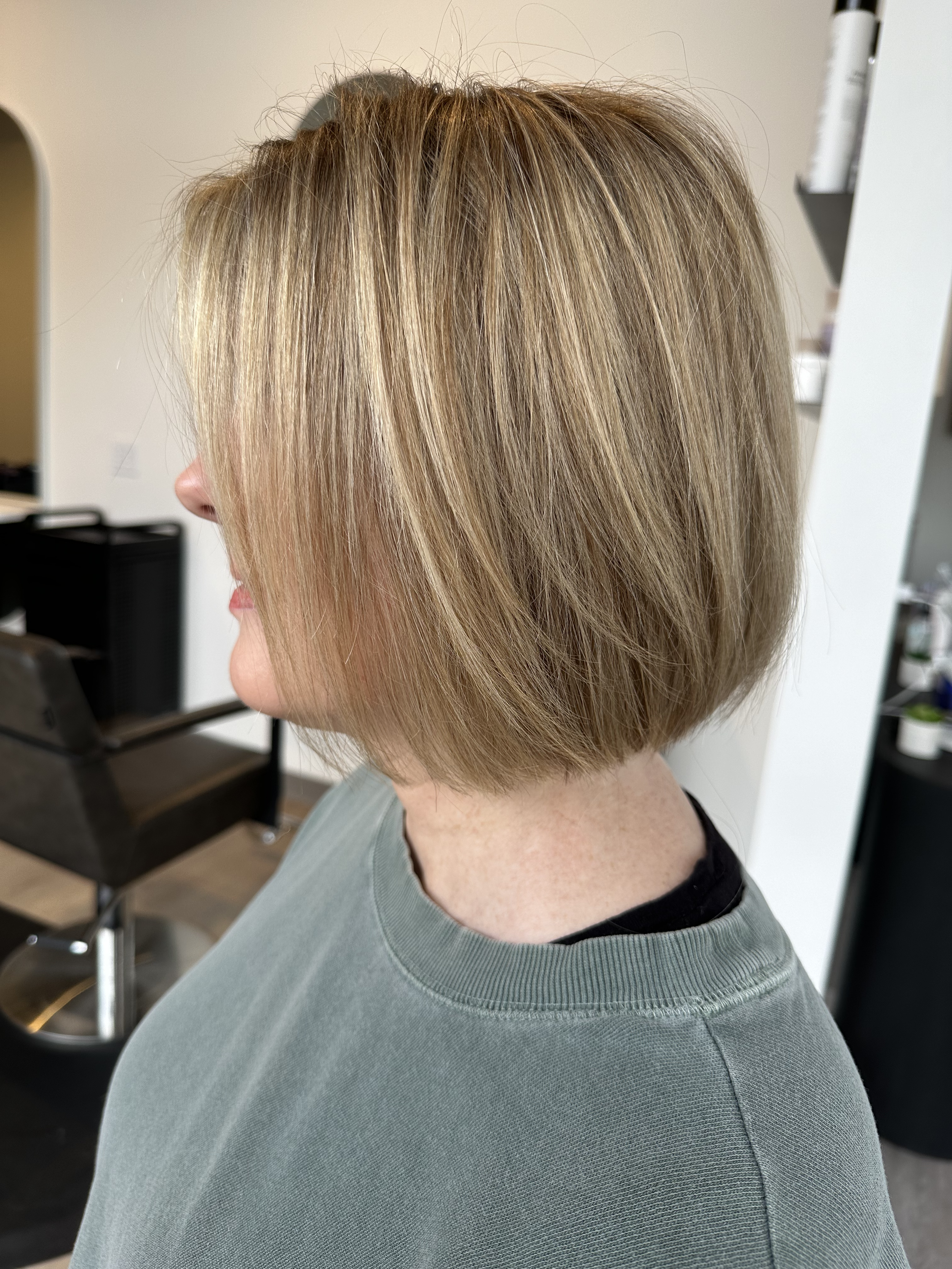 Blonde bob haircut with soft highlights at Grand Noir Salon in Verona, WI