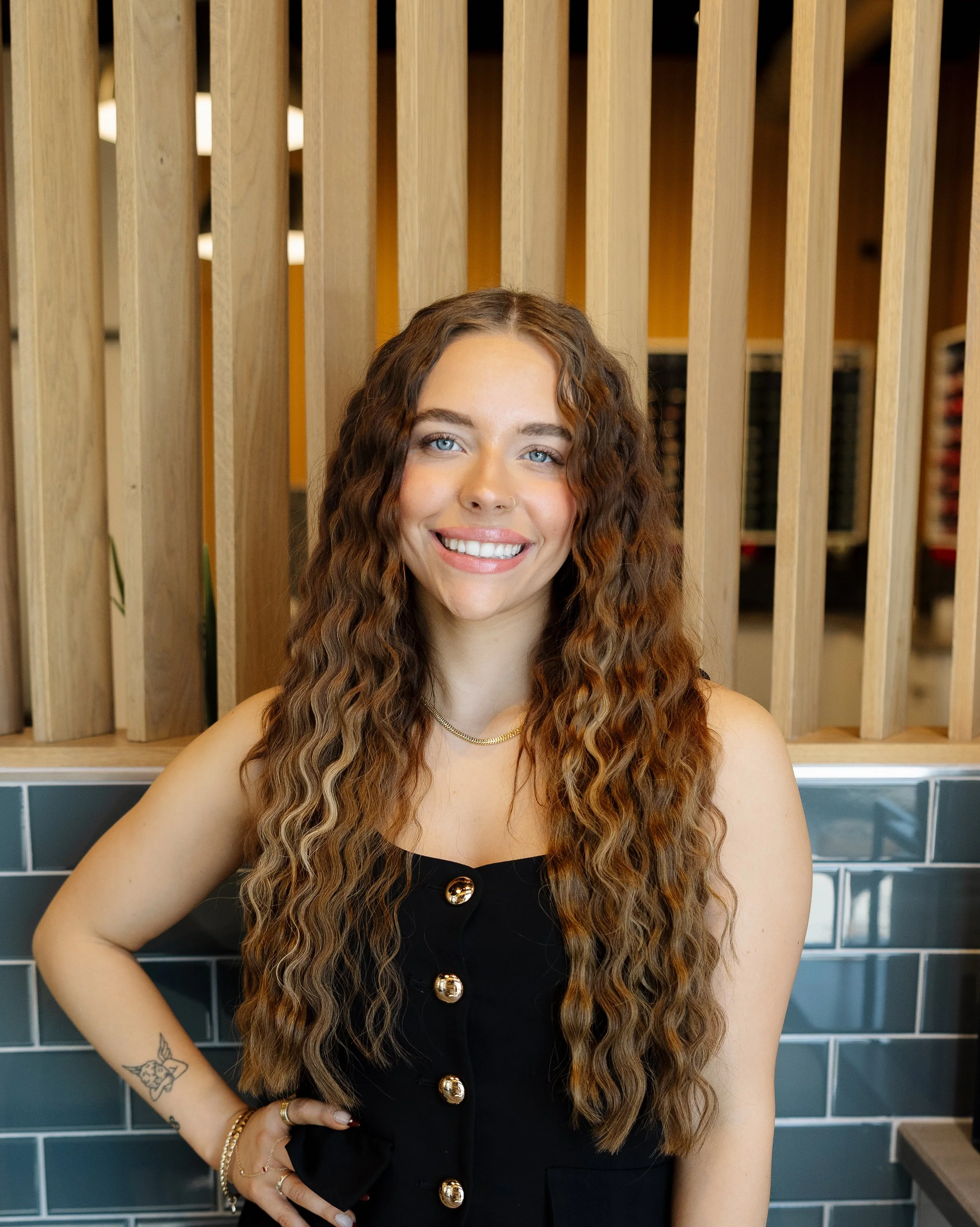 Izabel, hairstylist at Grand Noir Salon in Verona, WI